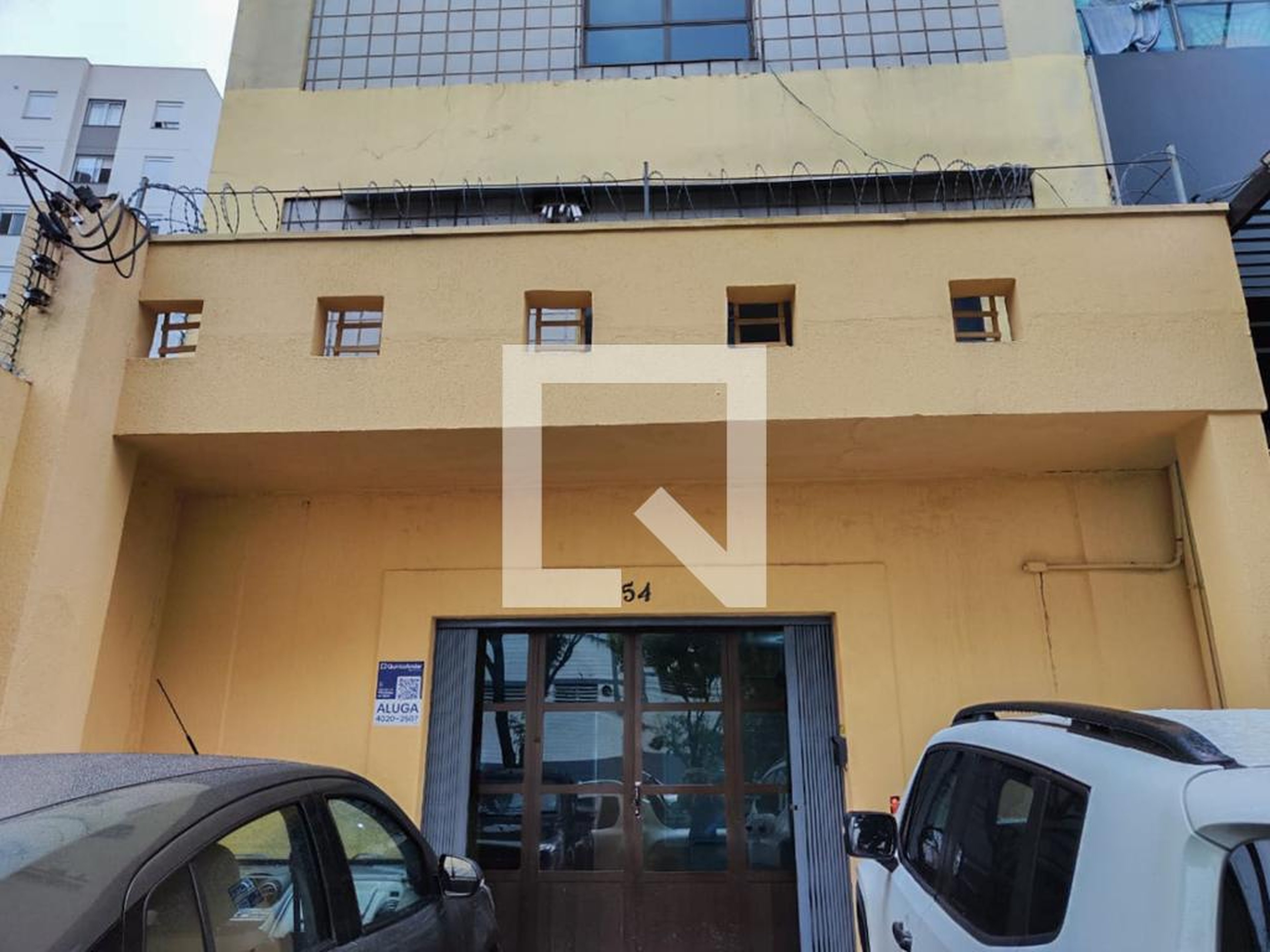 Fachada Condomínio em Rua João Veloso Filho, 54