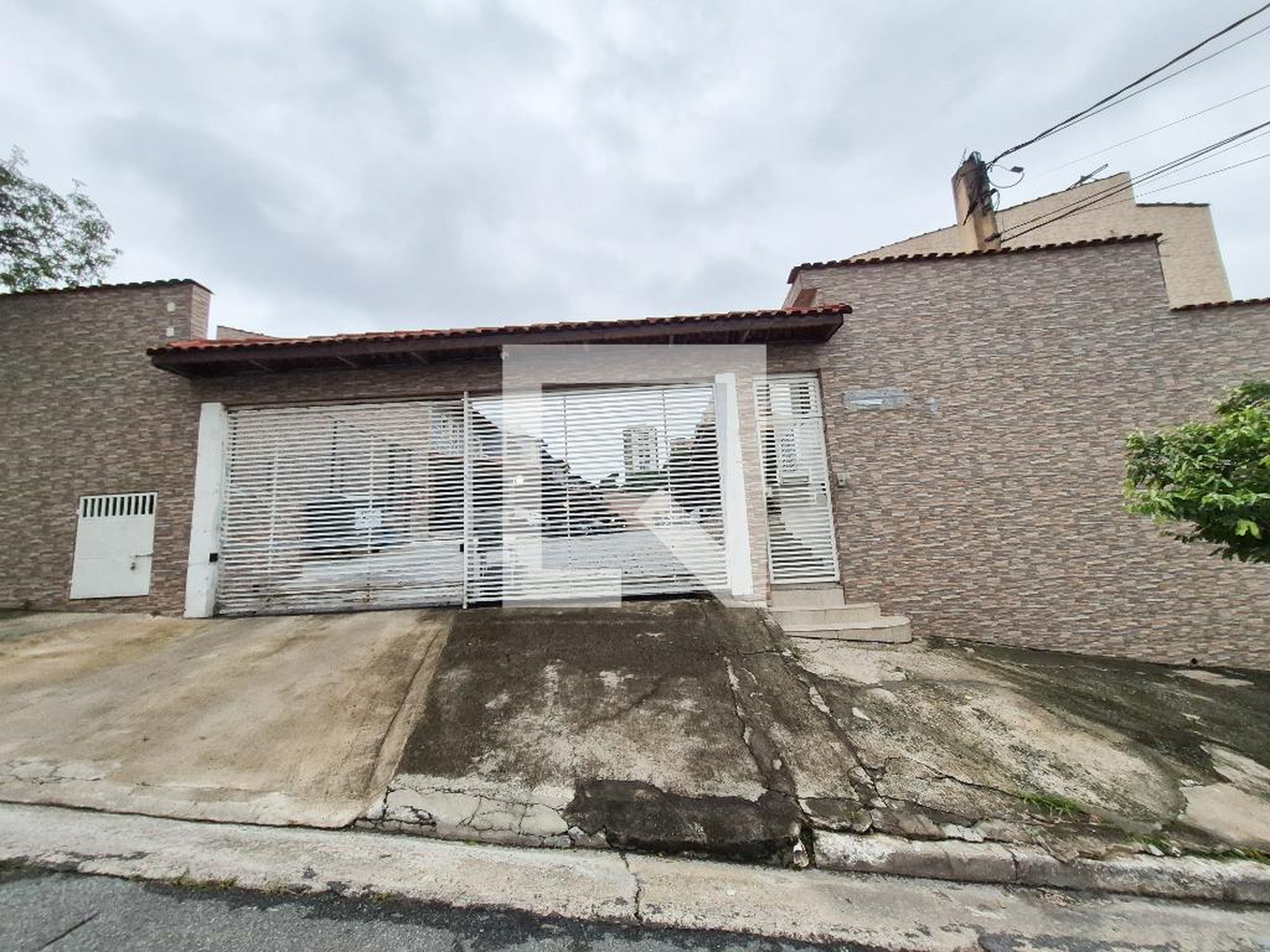 Fachada Condomínio em Rua Dudu, 80