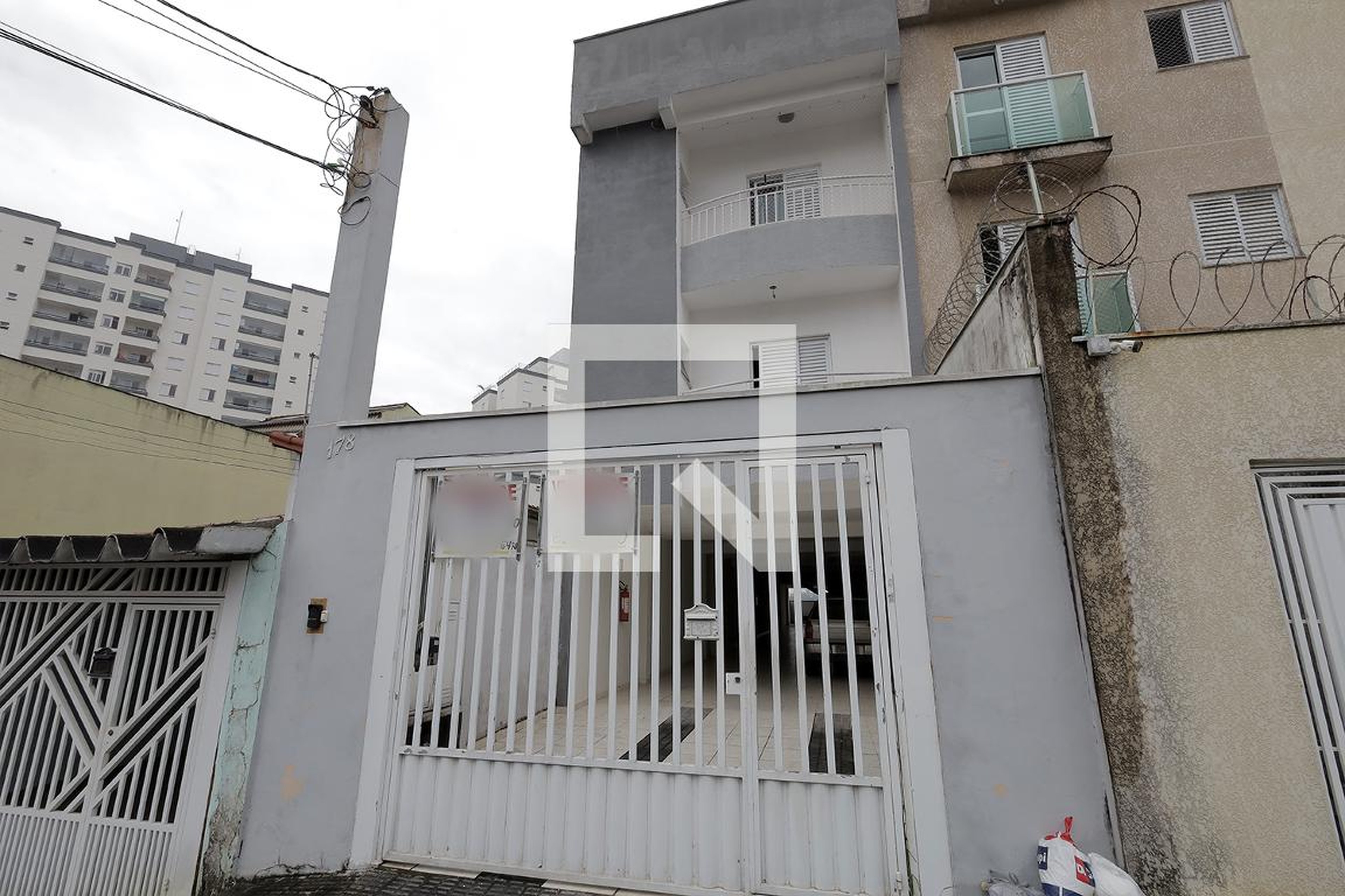Fachada Condomínio em Rua Horácio Hunti, 178
