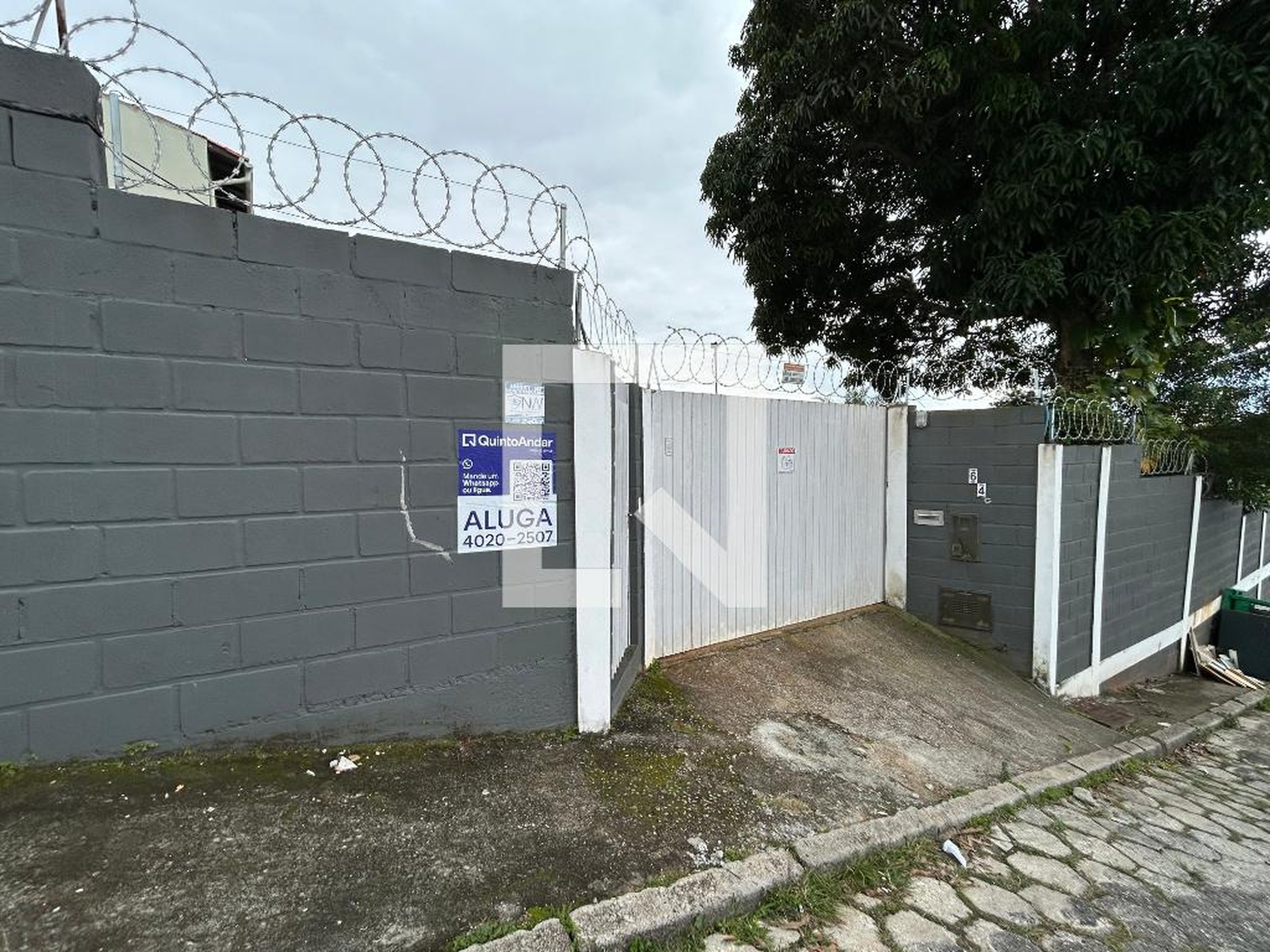 Fachada Condomínio em Rua Tupinambá, 64