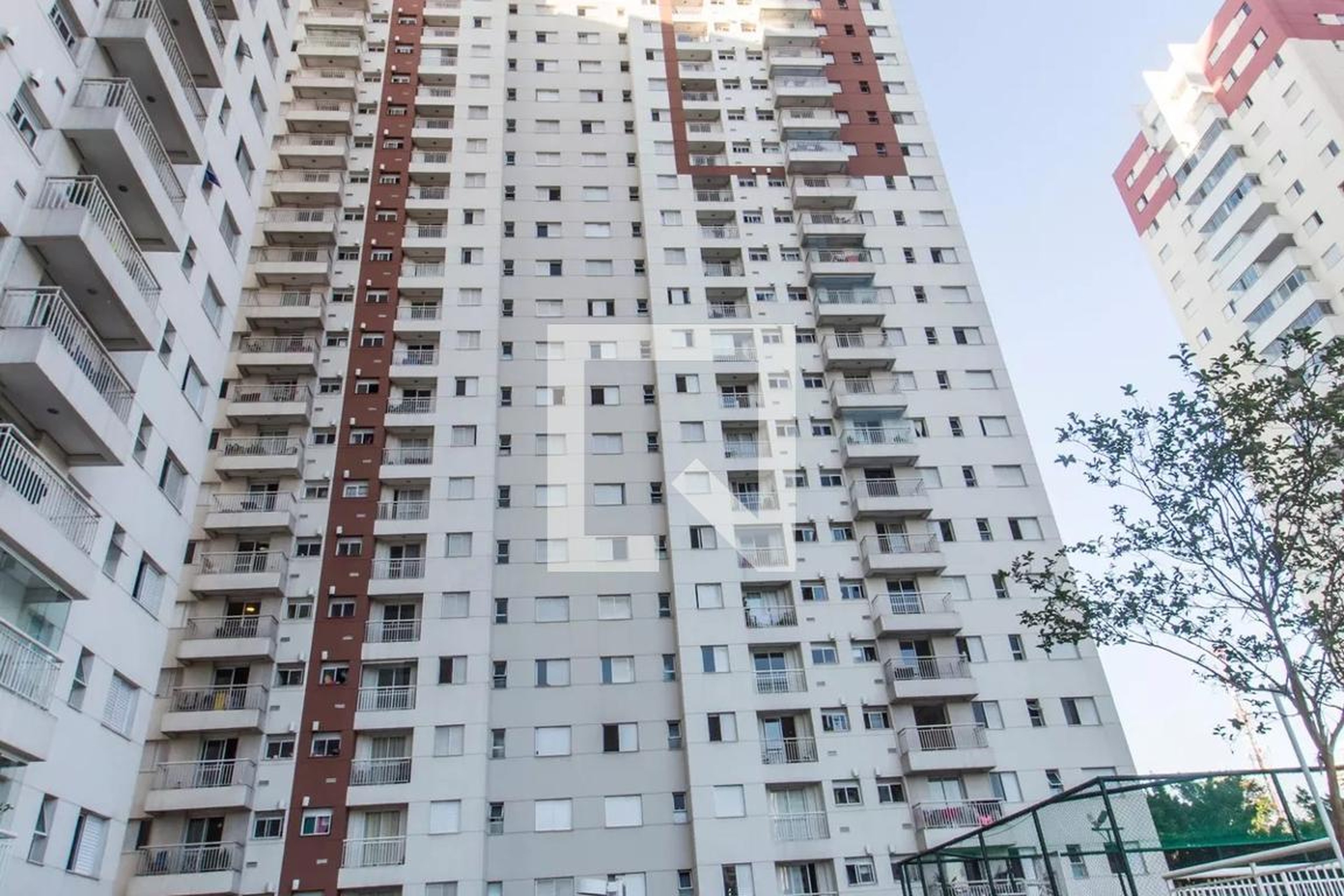 Fachada Condomínio Essencialle Home Club