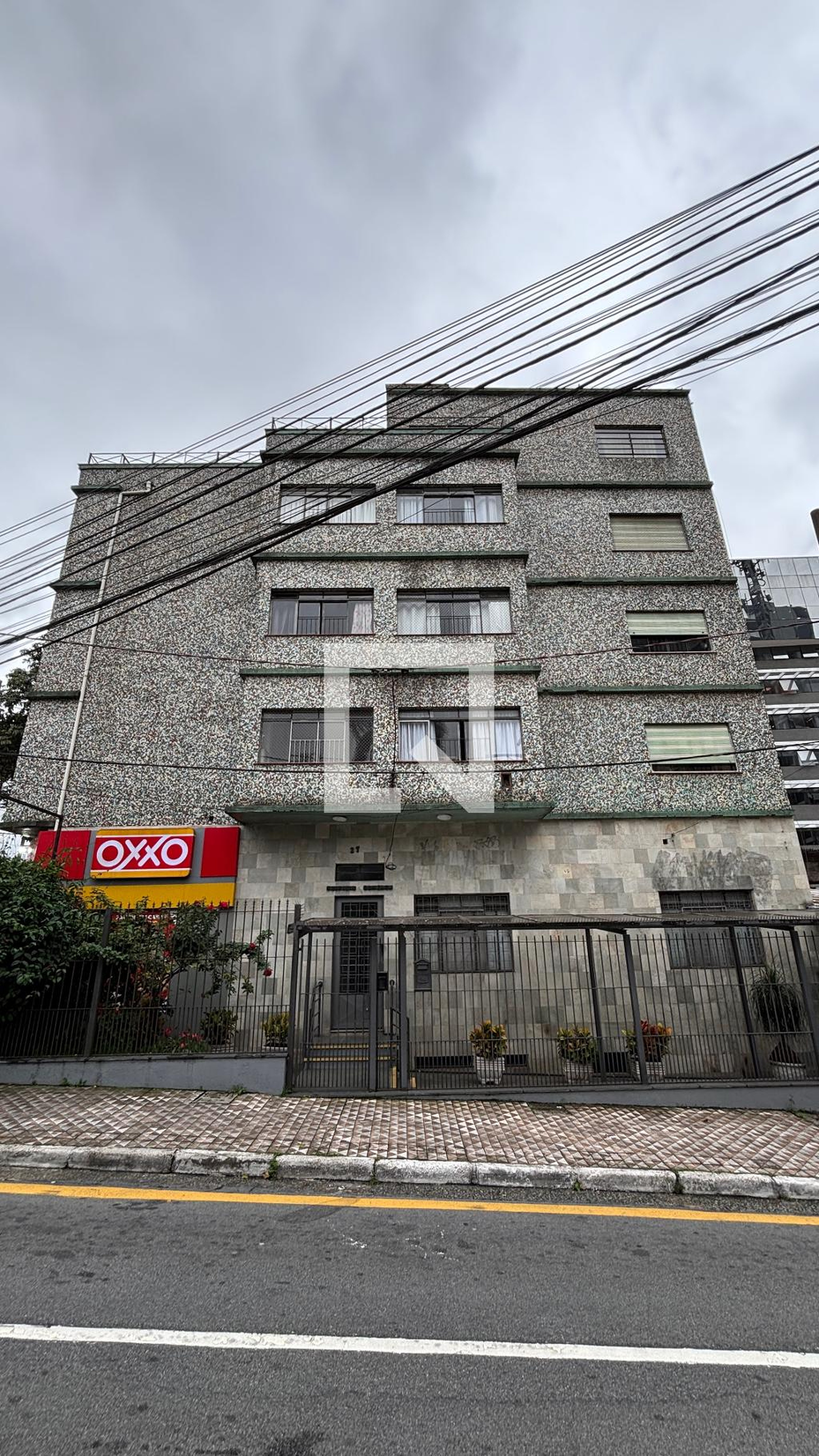 Fachada Condomínio em Rua Dona Elisa Fláquer, 27