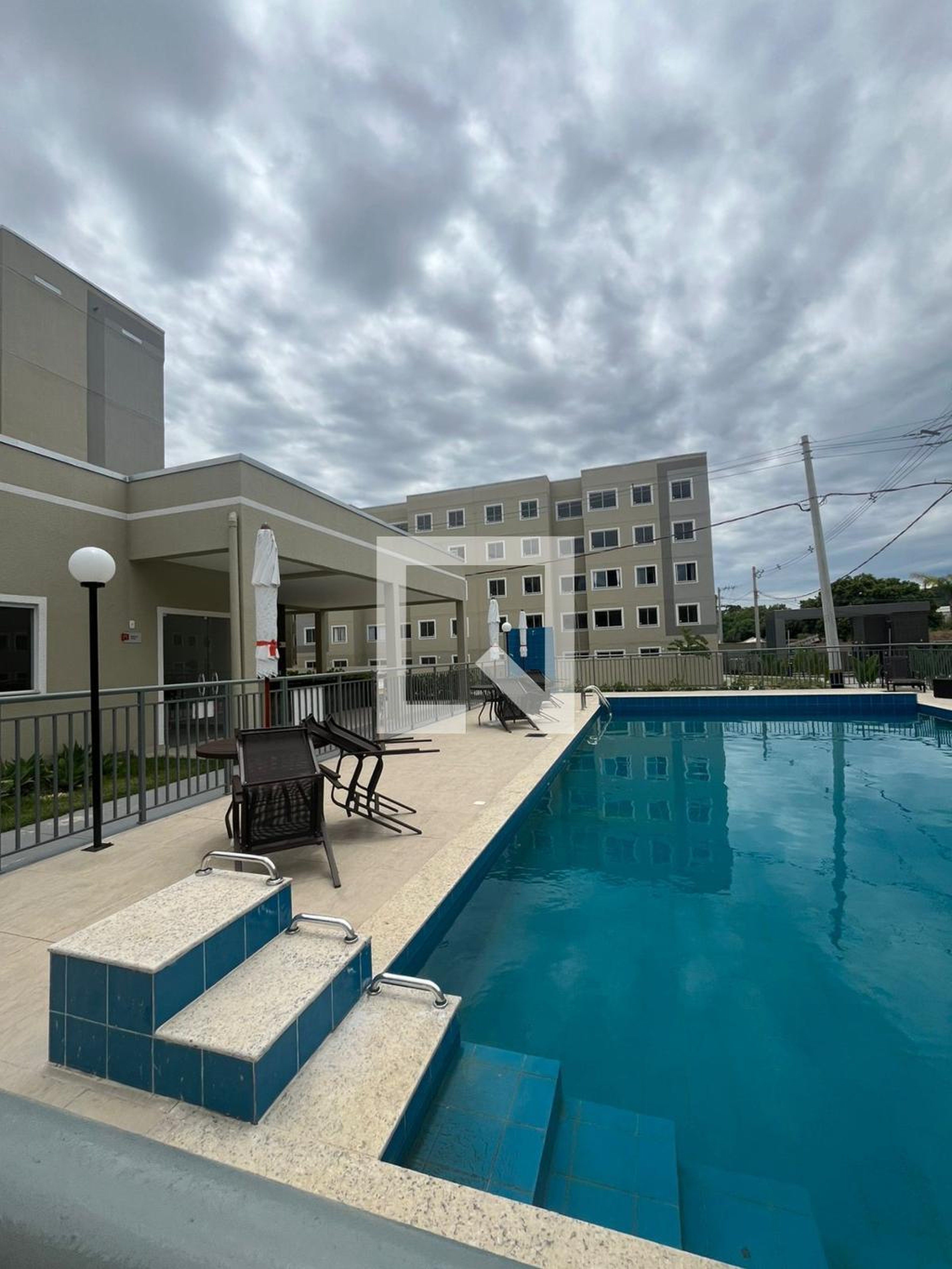 Área externa Condomínio em Rua Aloés, 98