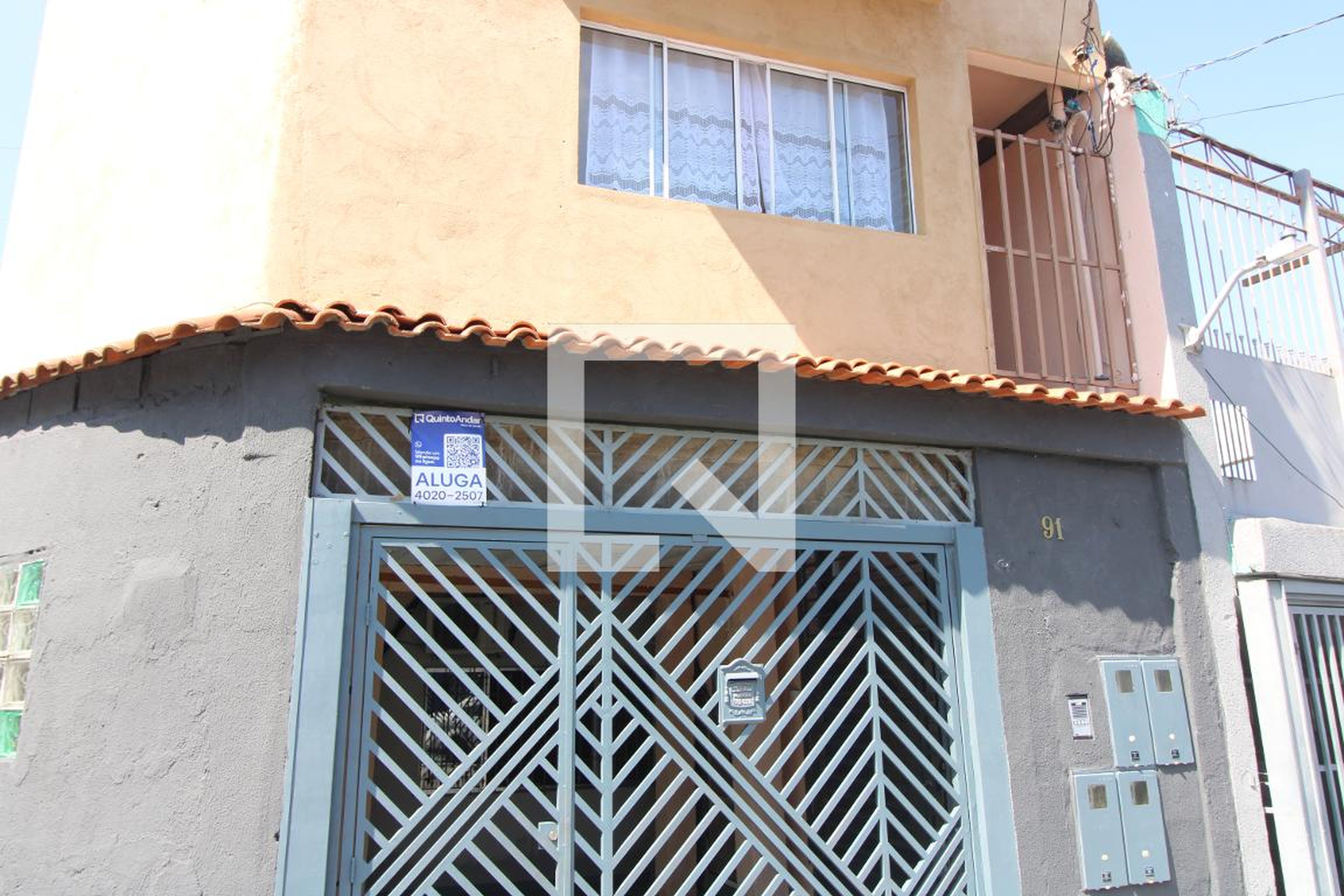 Fachada Condomínio em Rua Quinta da Magnólia, 91