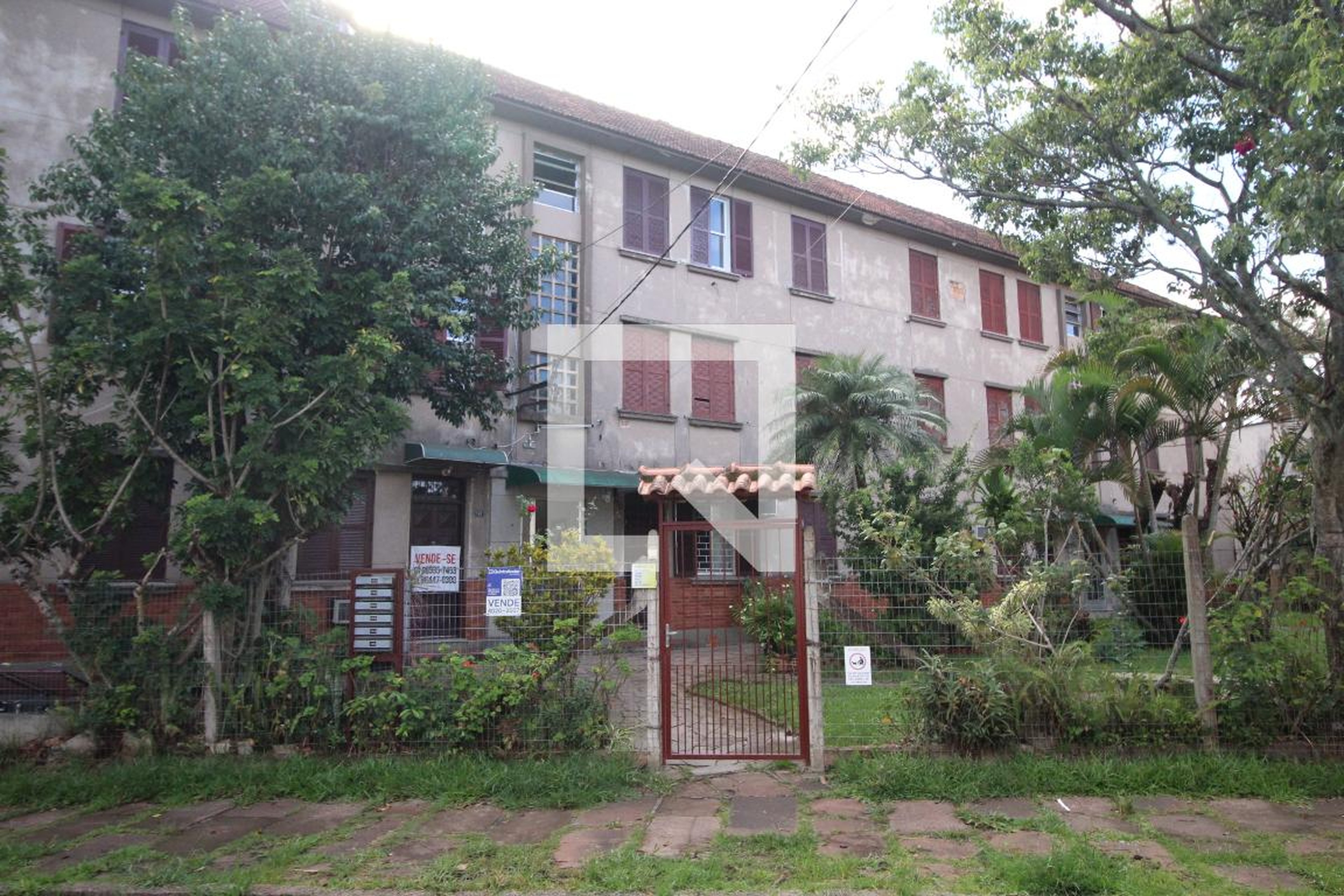 Fachada Condomínio em Rua Tuparaí, 170