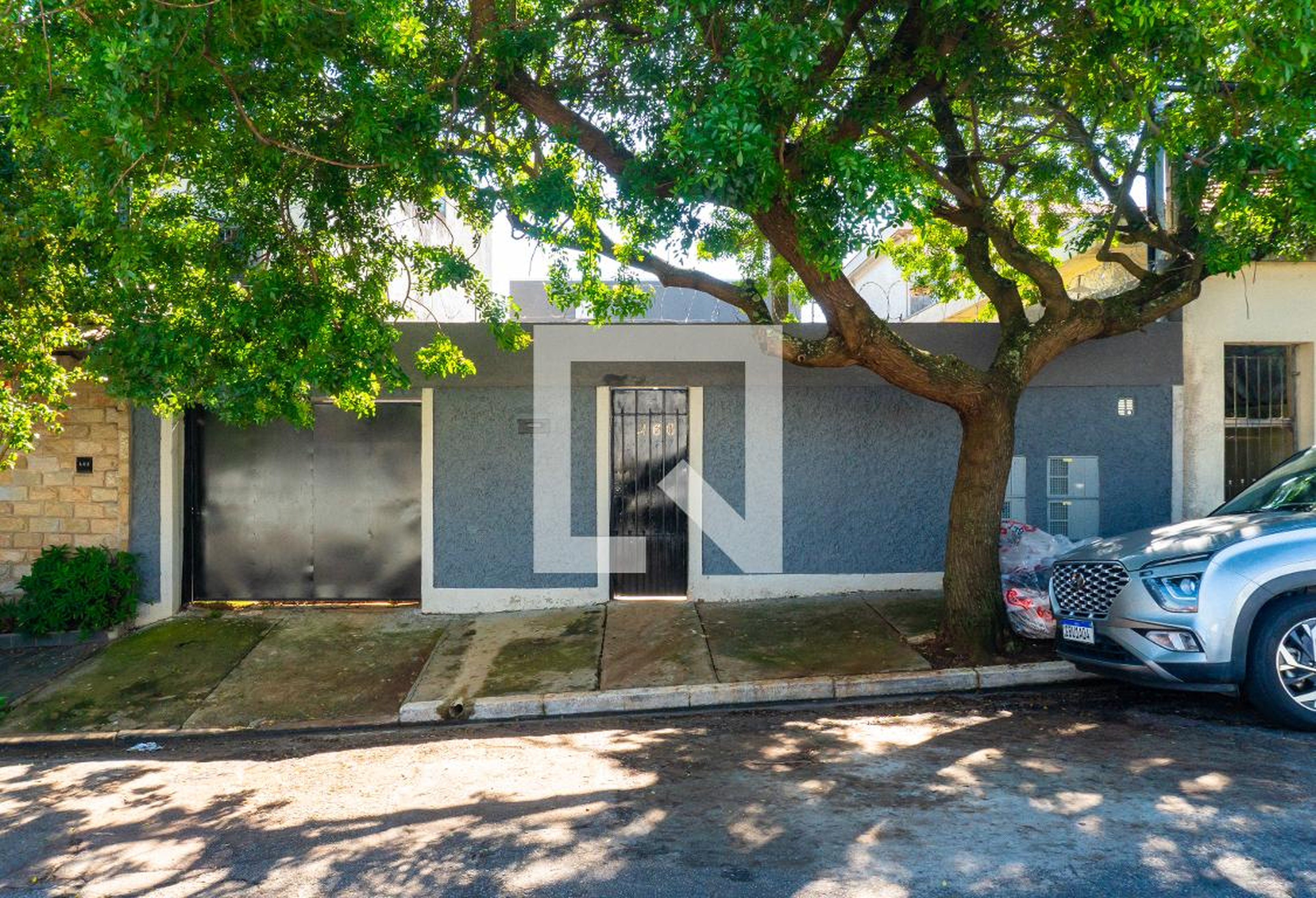 Fachada Condomínio em Rua Apacê, 460