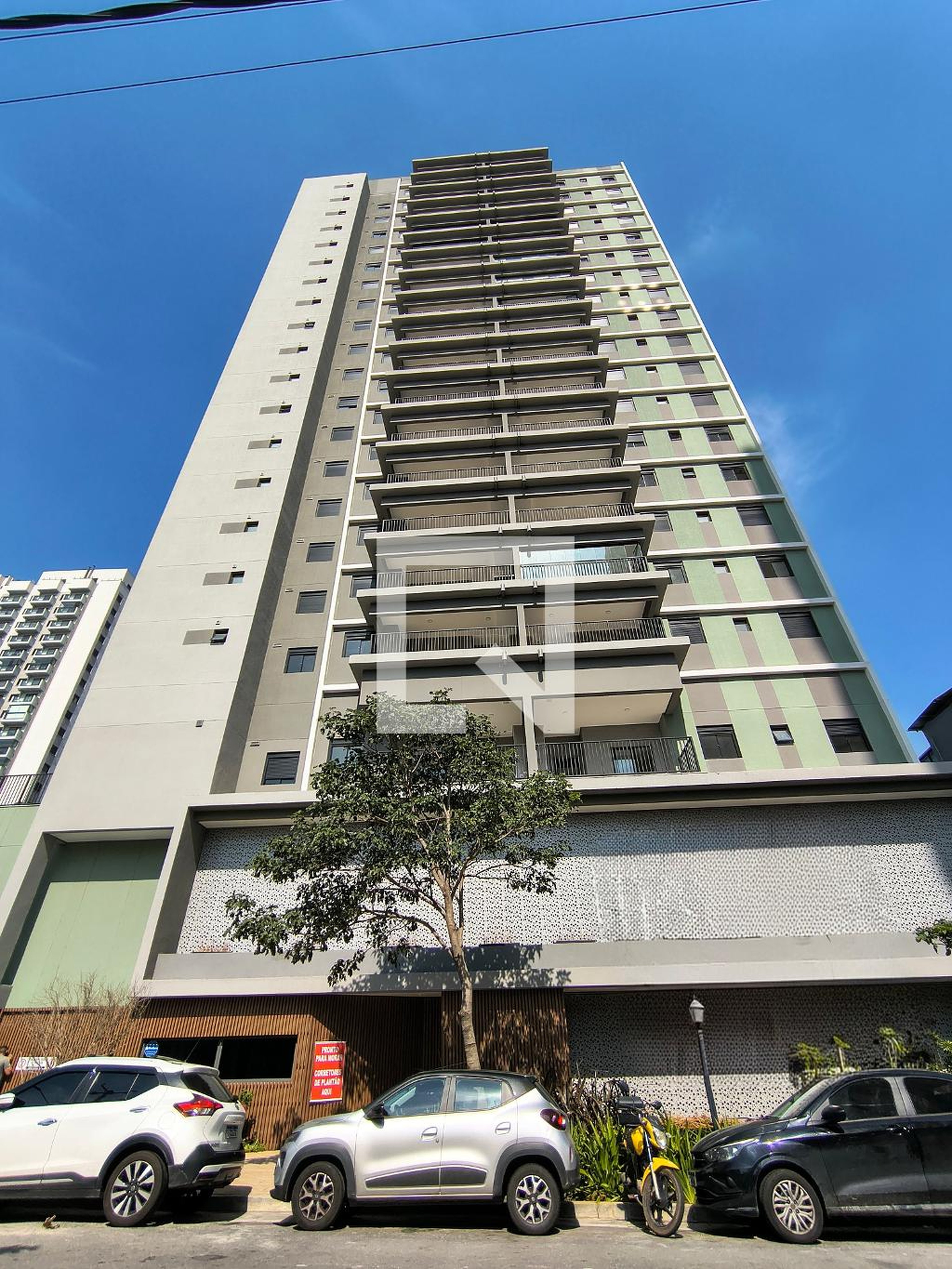 Fachada Condomínio em Rua Comendador Elias Assi, 103