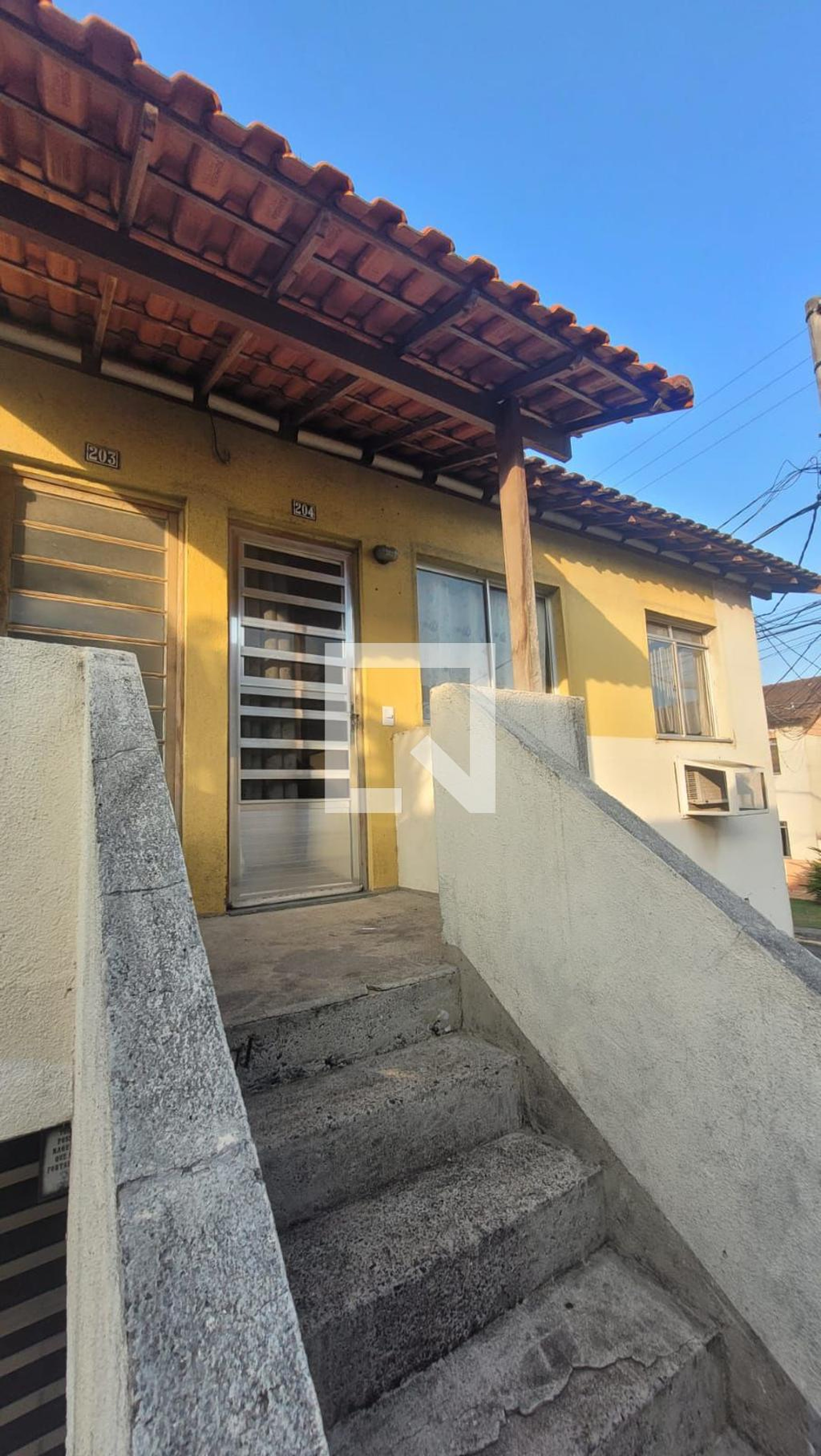 Fachada Condomínio em Rua Vala do Sangue, 660