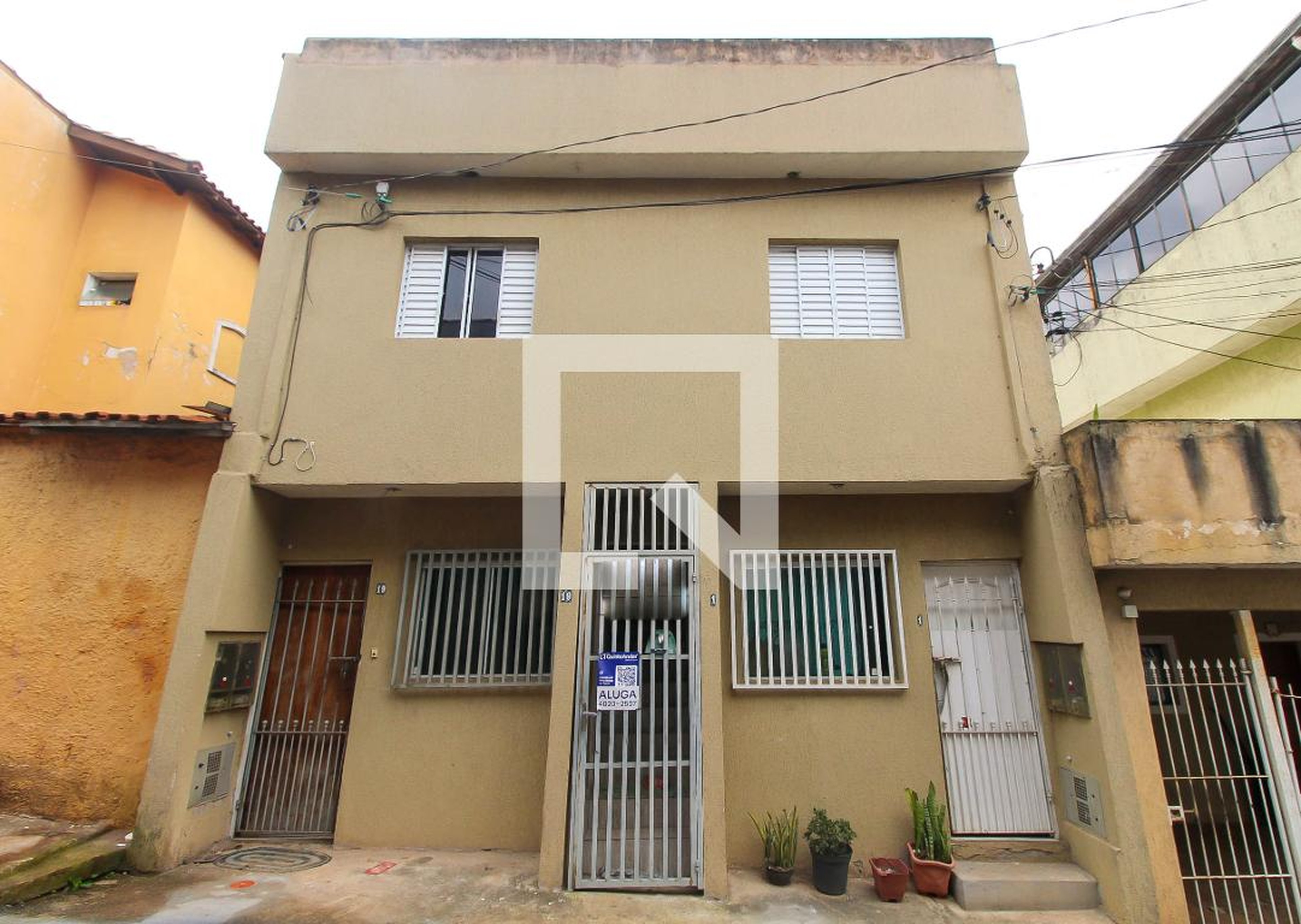 Fachada Condomínio em Rua Alfredo Pássaro, 19