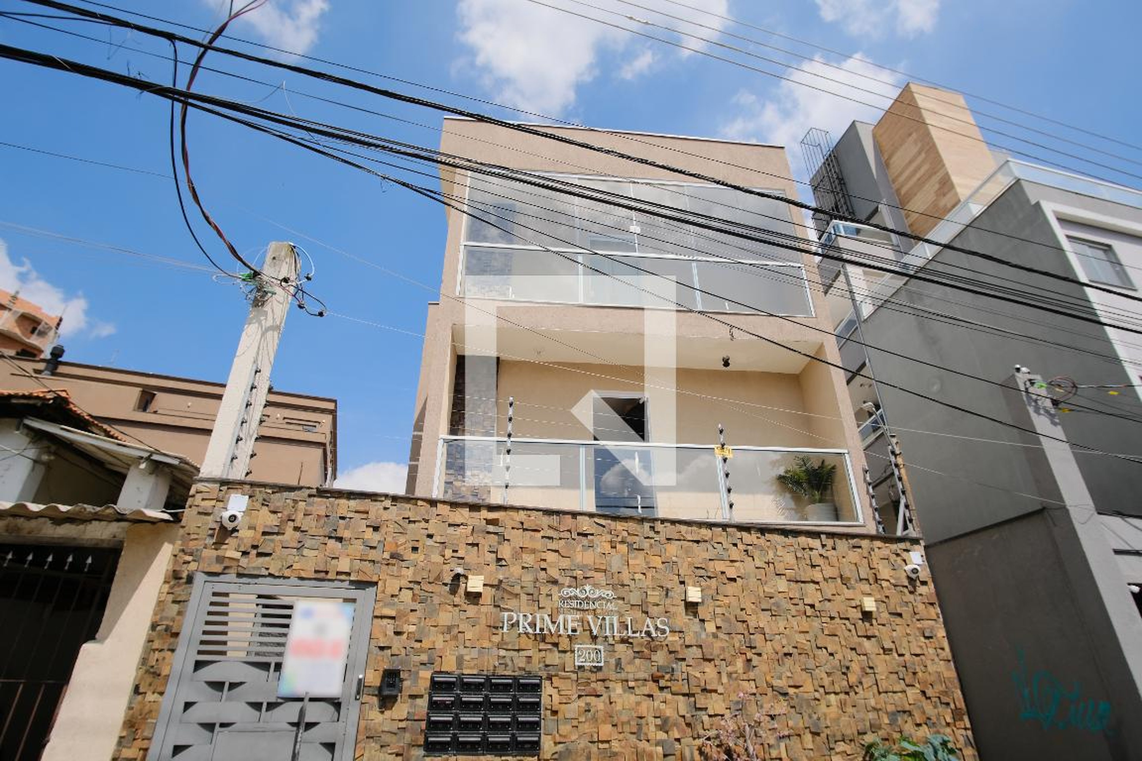 Fachada Residencial Pirme Villas