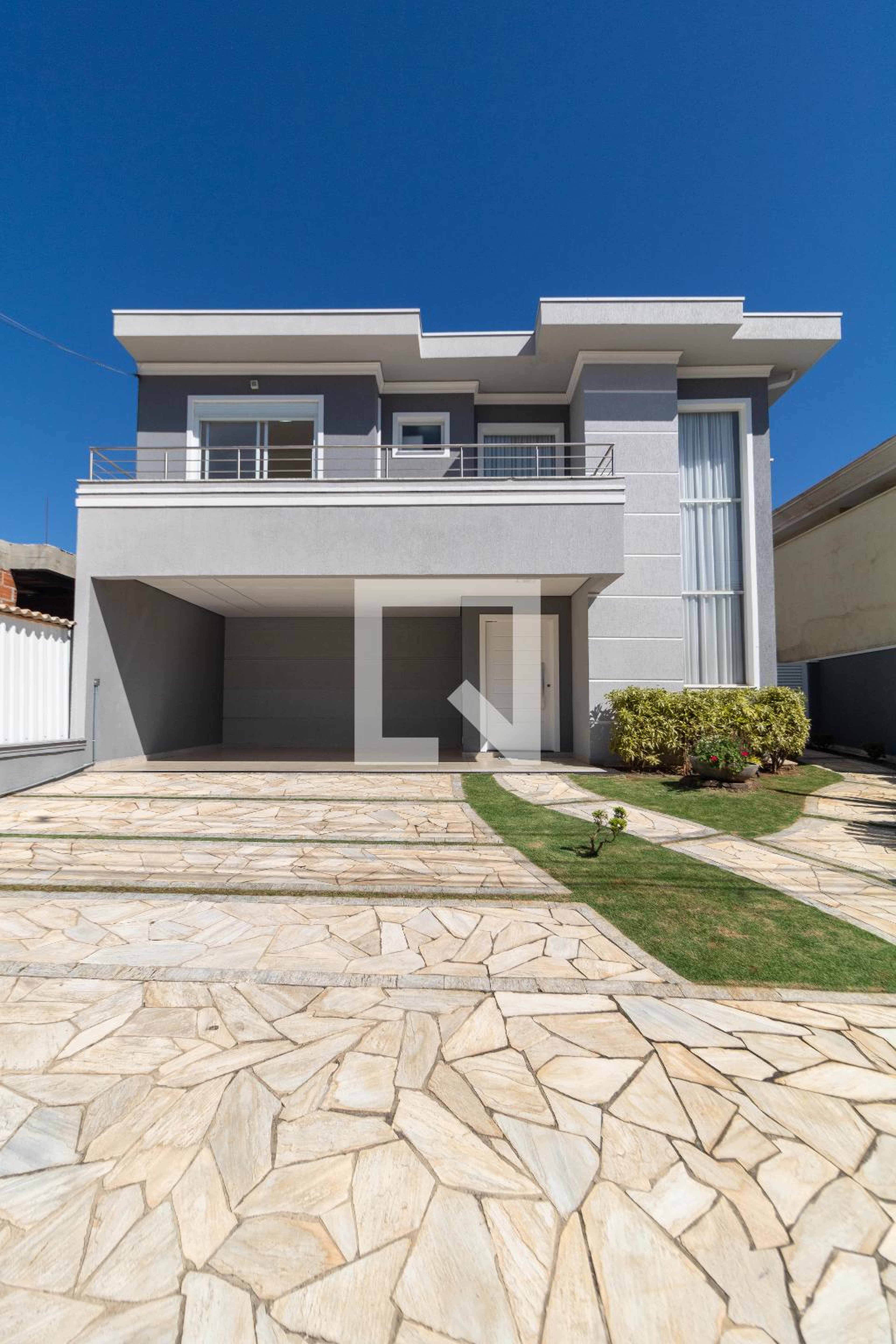 Fachada Condomínio em Rua Mário Righi, 34