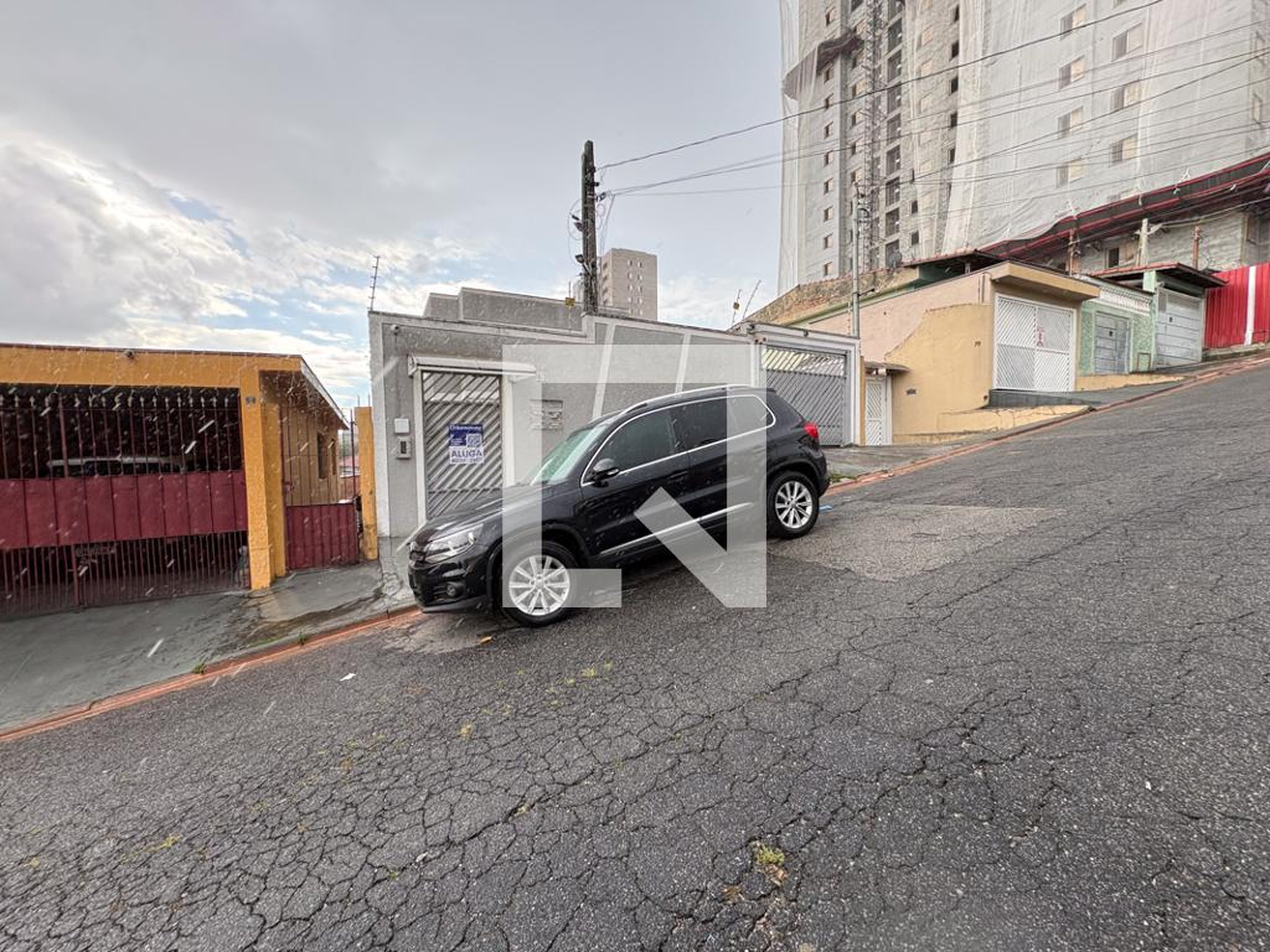 Fachada Condomínio em Rua Oti, 63