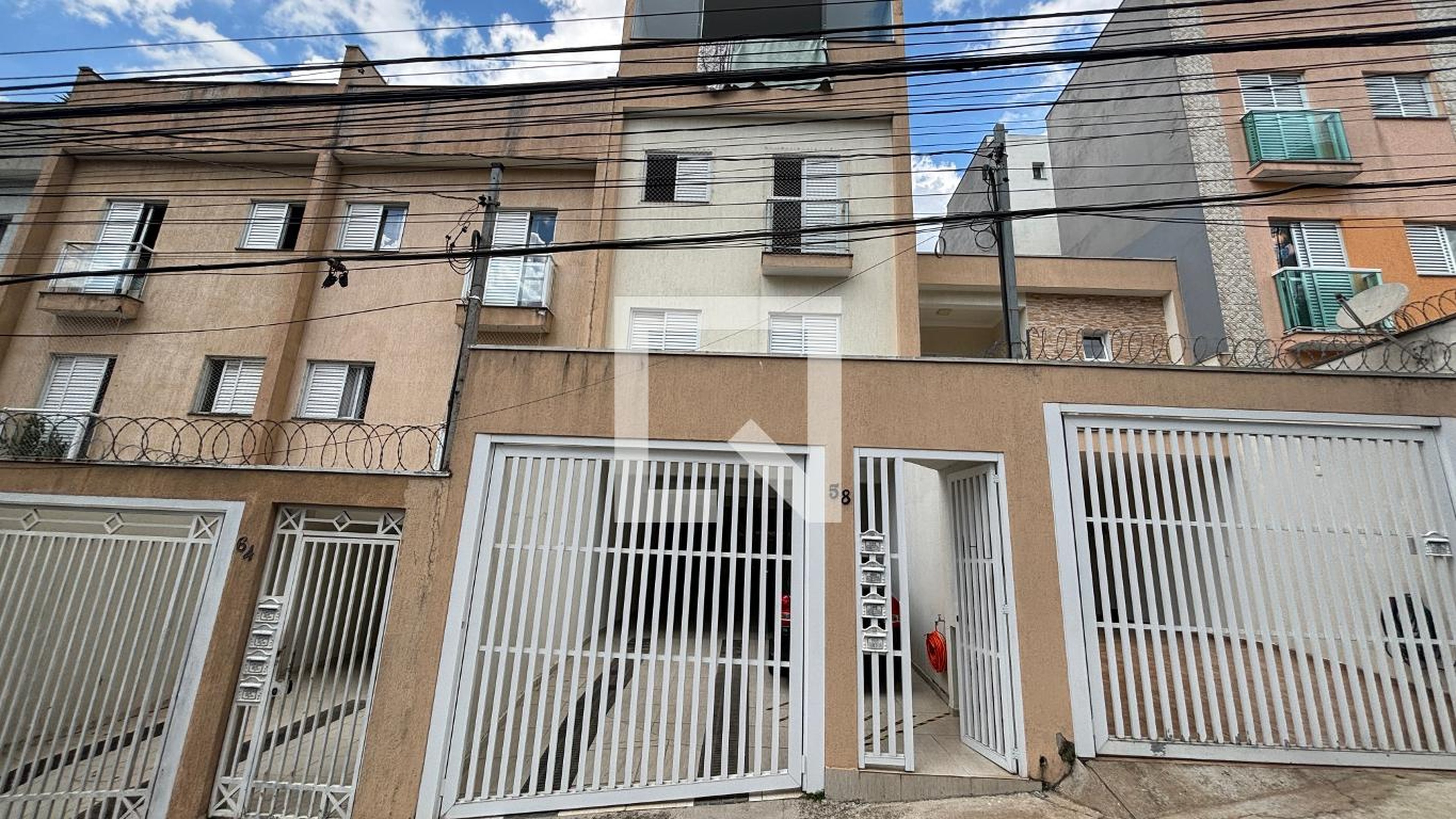 Fachada Condomínio em Rua Catigua, 58