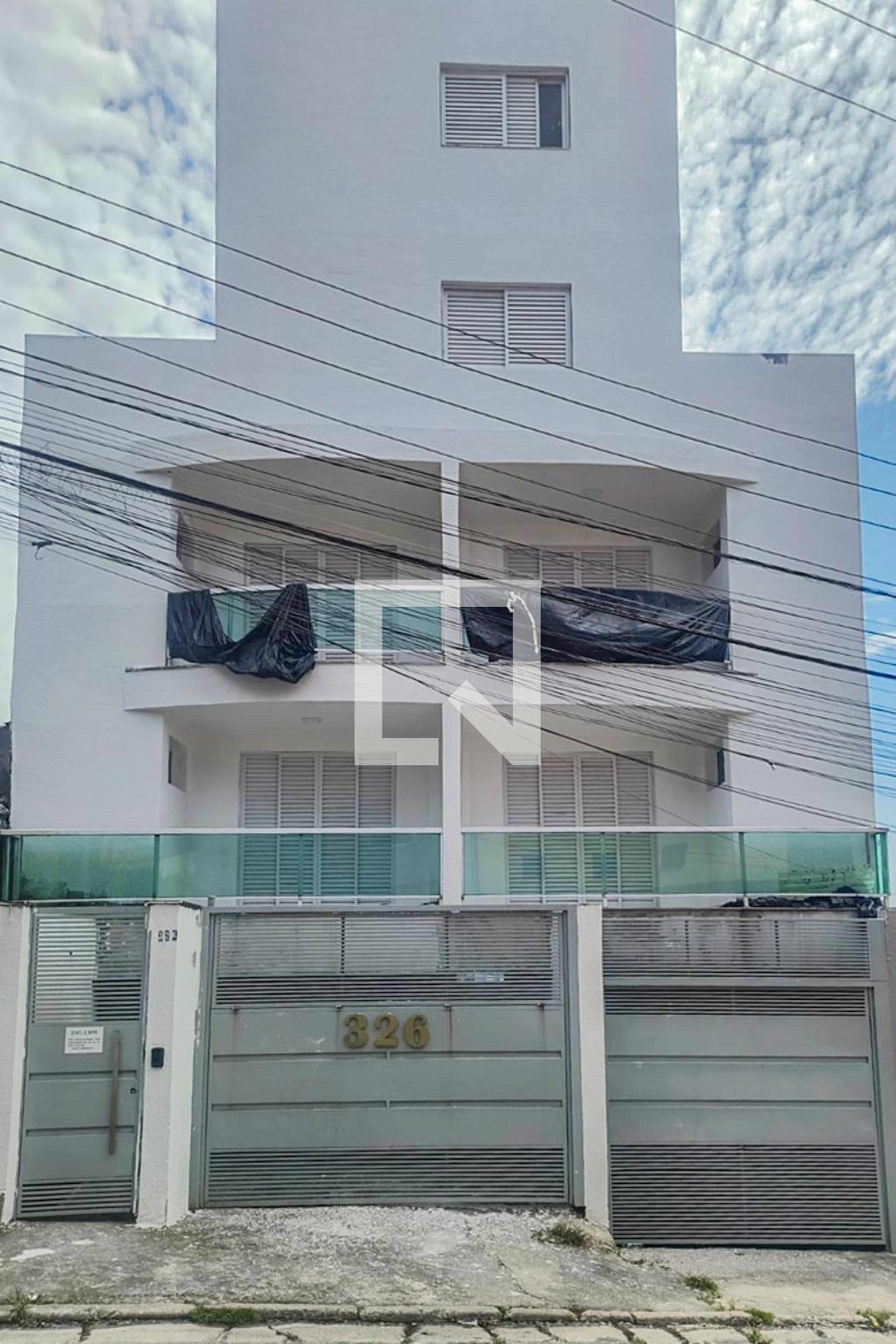 Fachada Condomínio em Rua Luís Benasso, 326