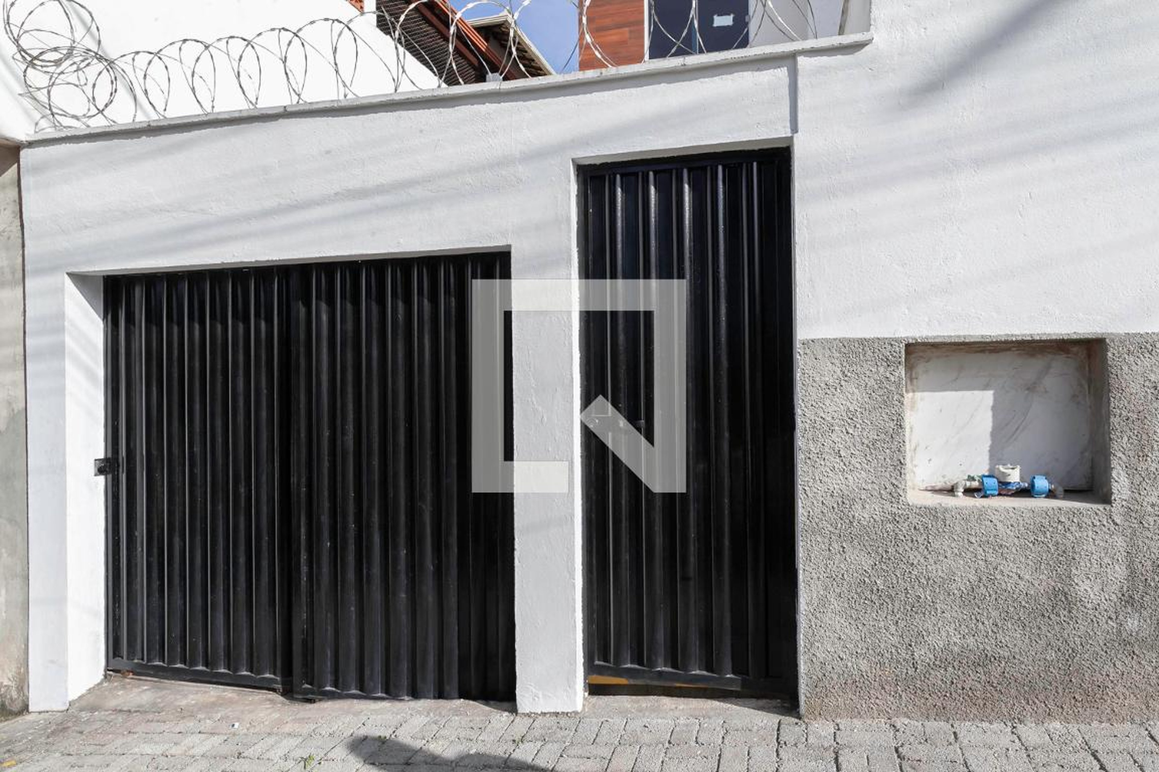 Fachada Condomínio em Rua Colinas, 172