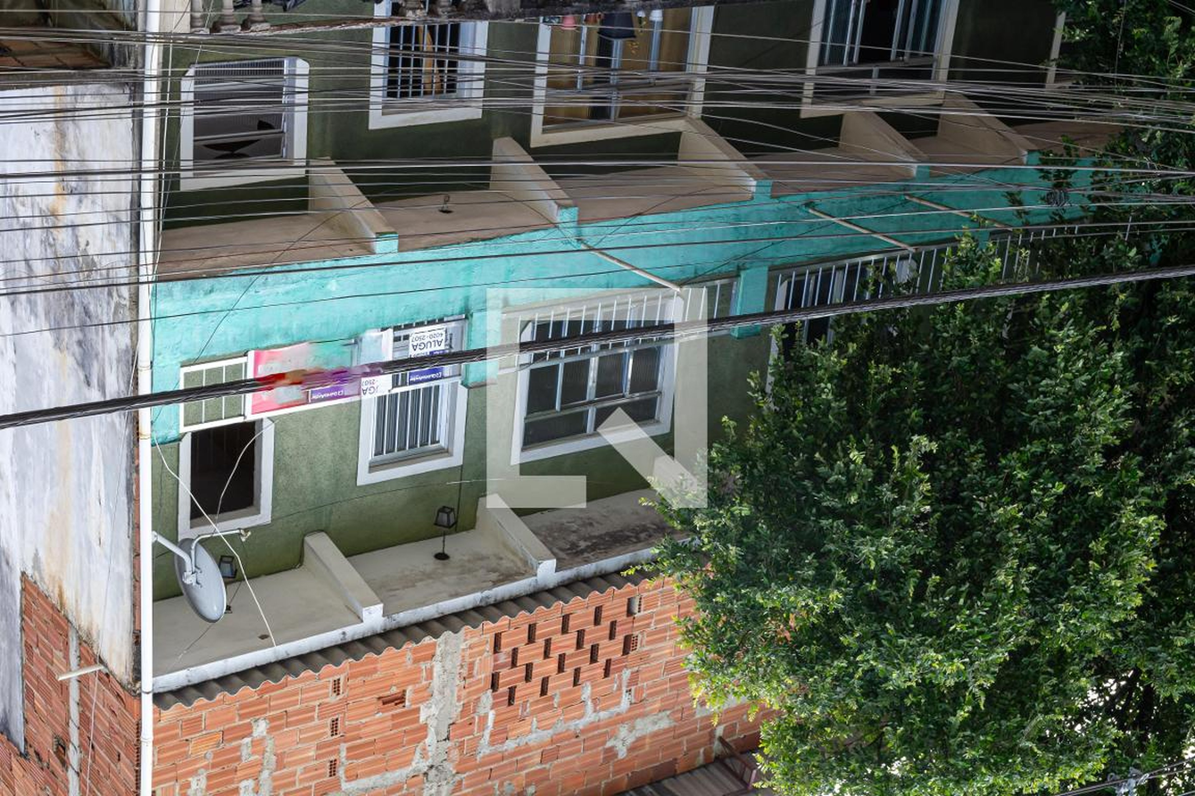 Fachada Condomínio em Rua Carlos Delgado de Carvalho, 14