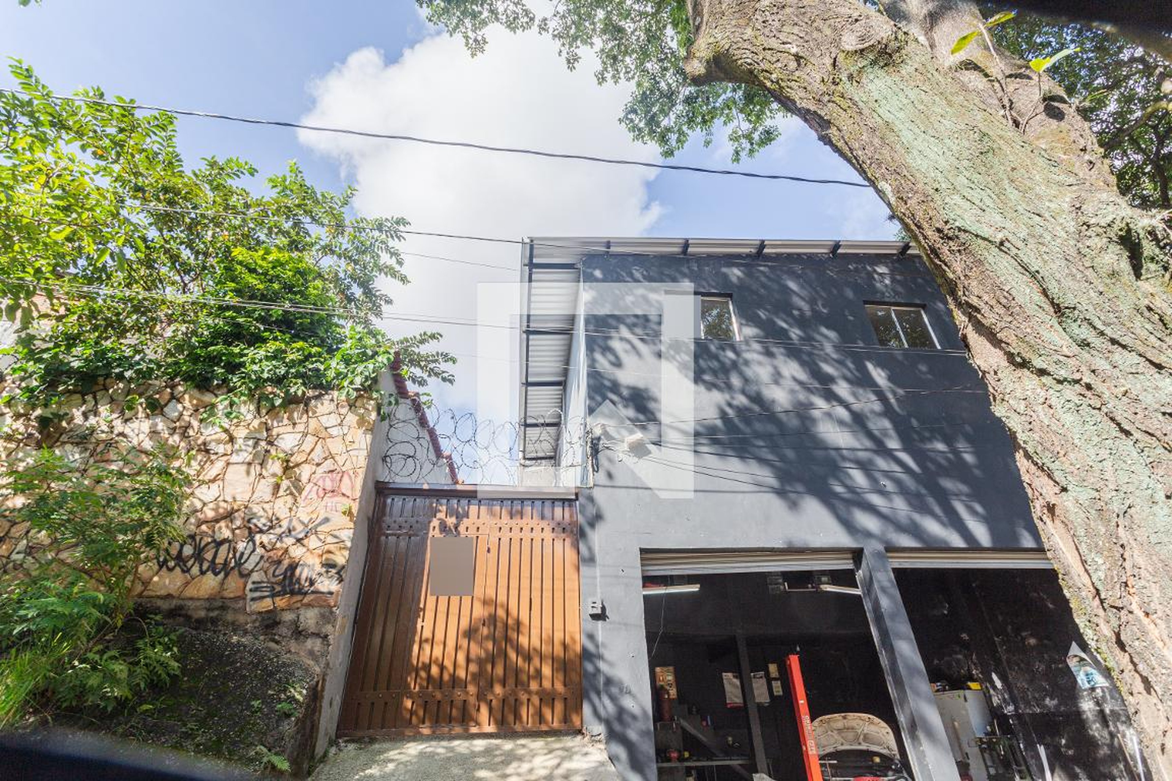 Fachada Condomínio em Rua Cocáis, 384