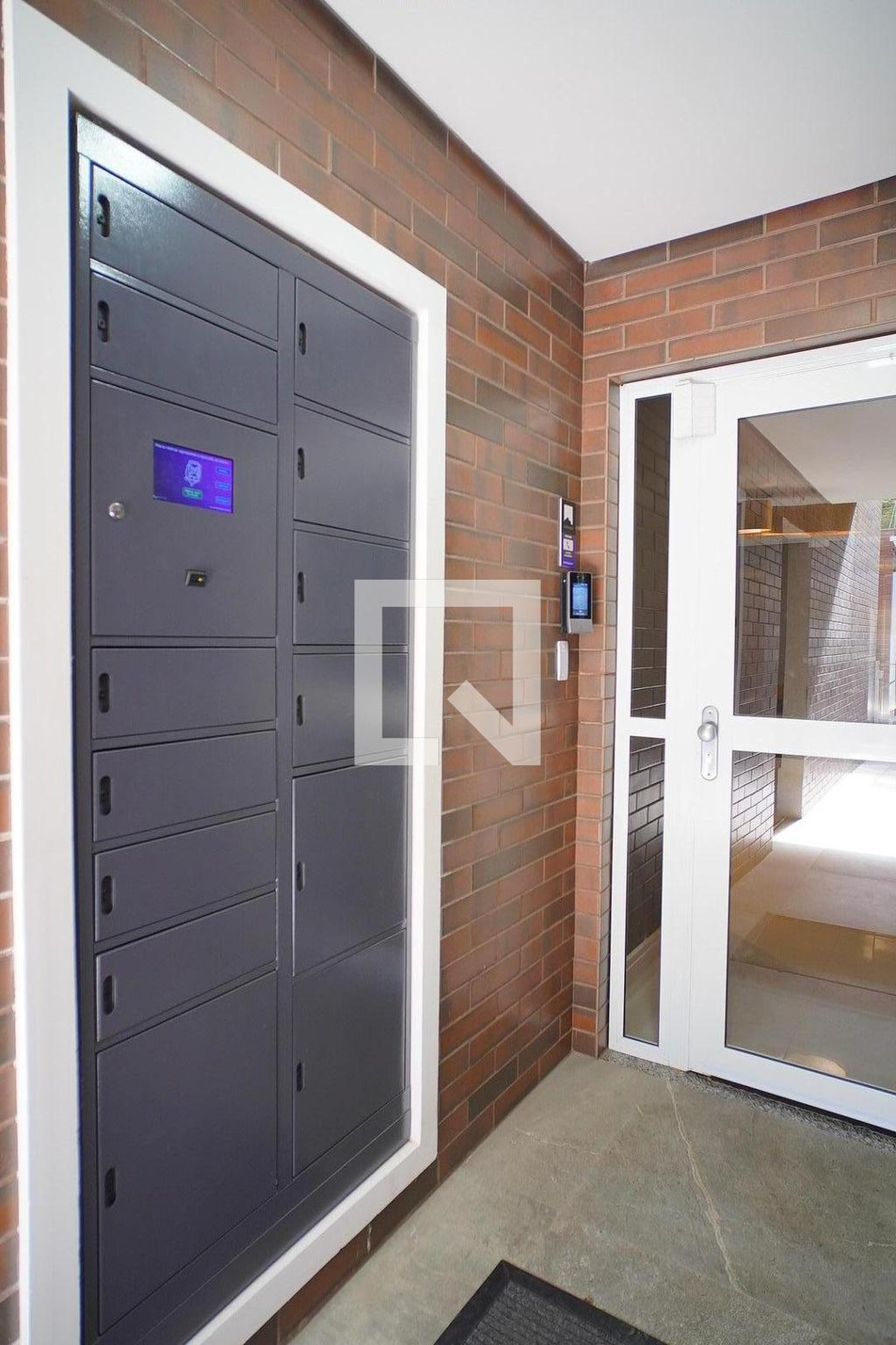 Hall de entrada - Edifício Vivant Residencial