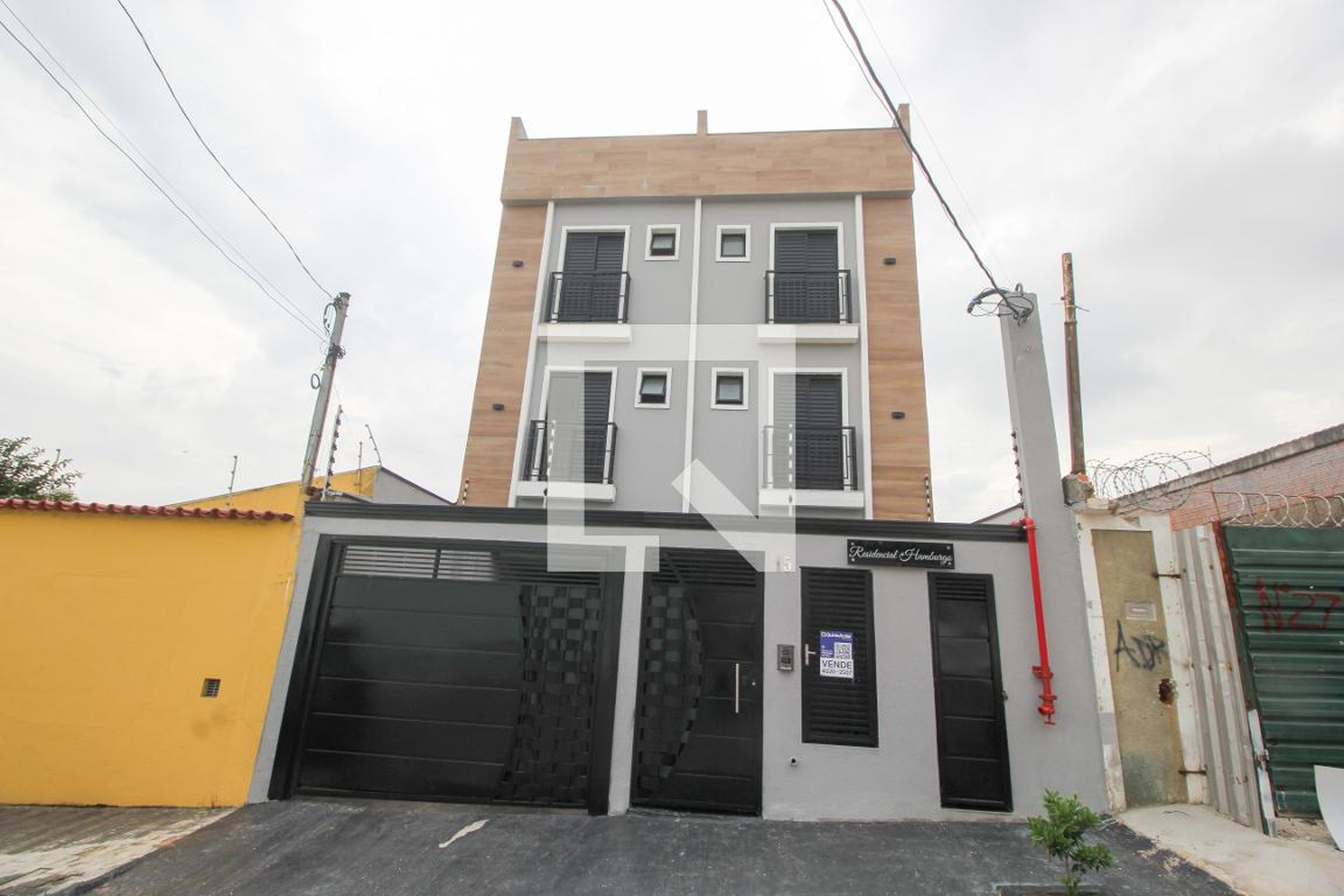 Fachada Condomínio em Rua Odorinda, 15