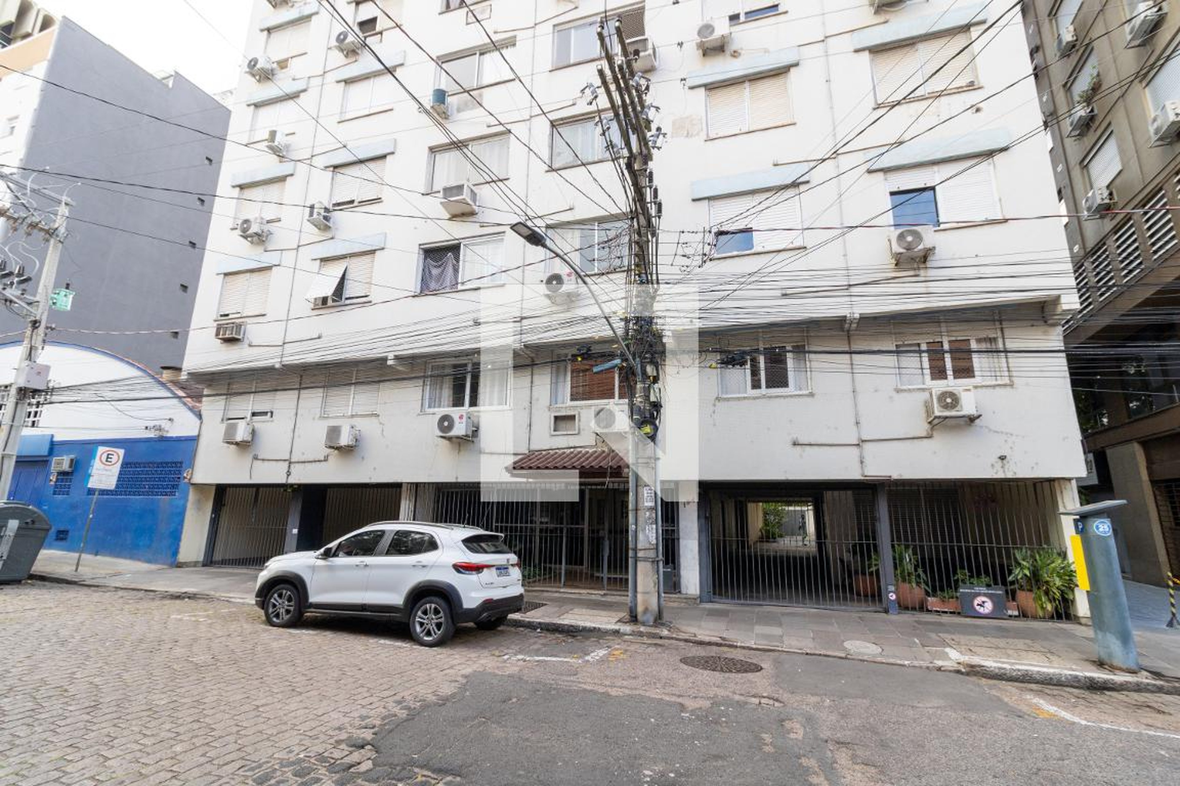 Fachada Condomínio em Rua Coronel Genuíno, 194