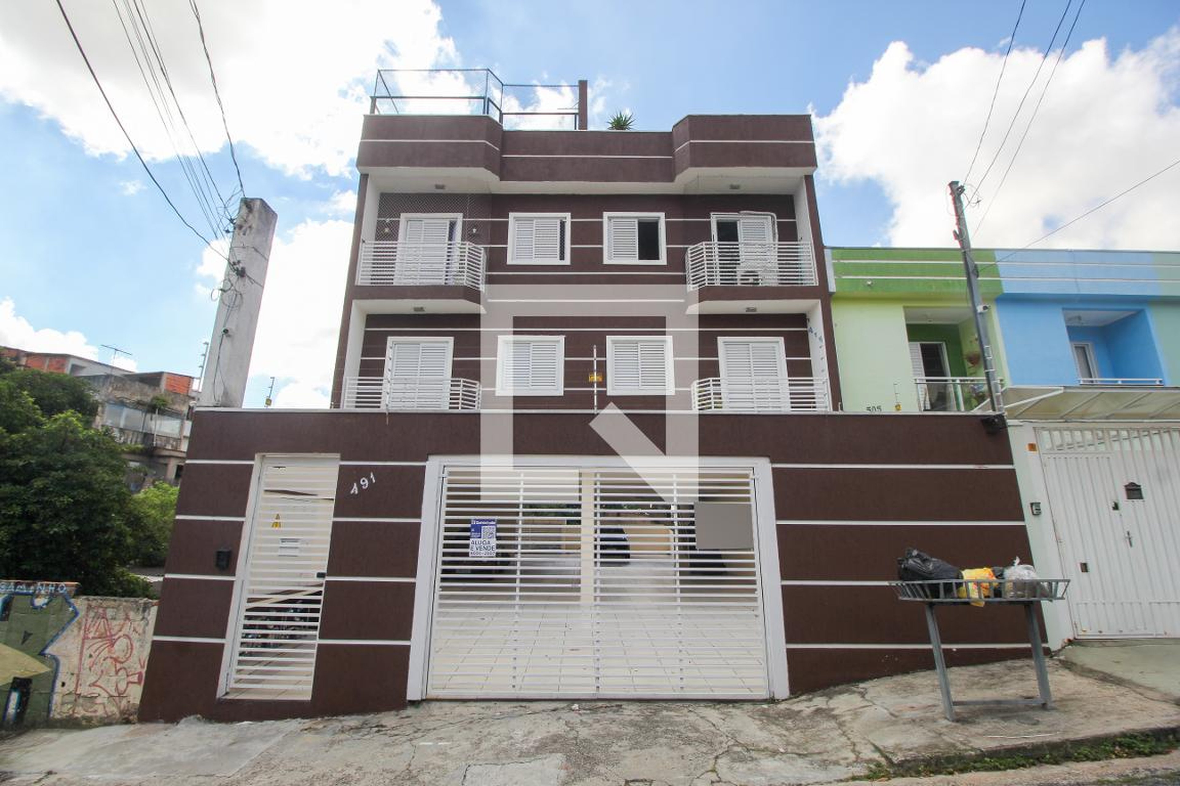 Fachada Condomínio em Rua Tupinambás, 491