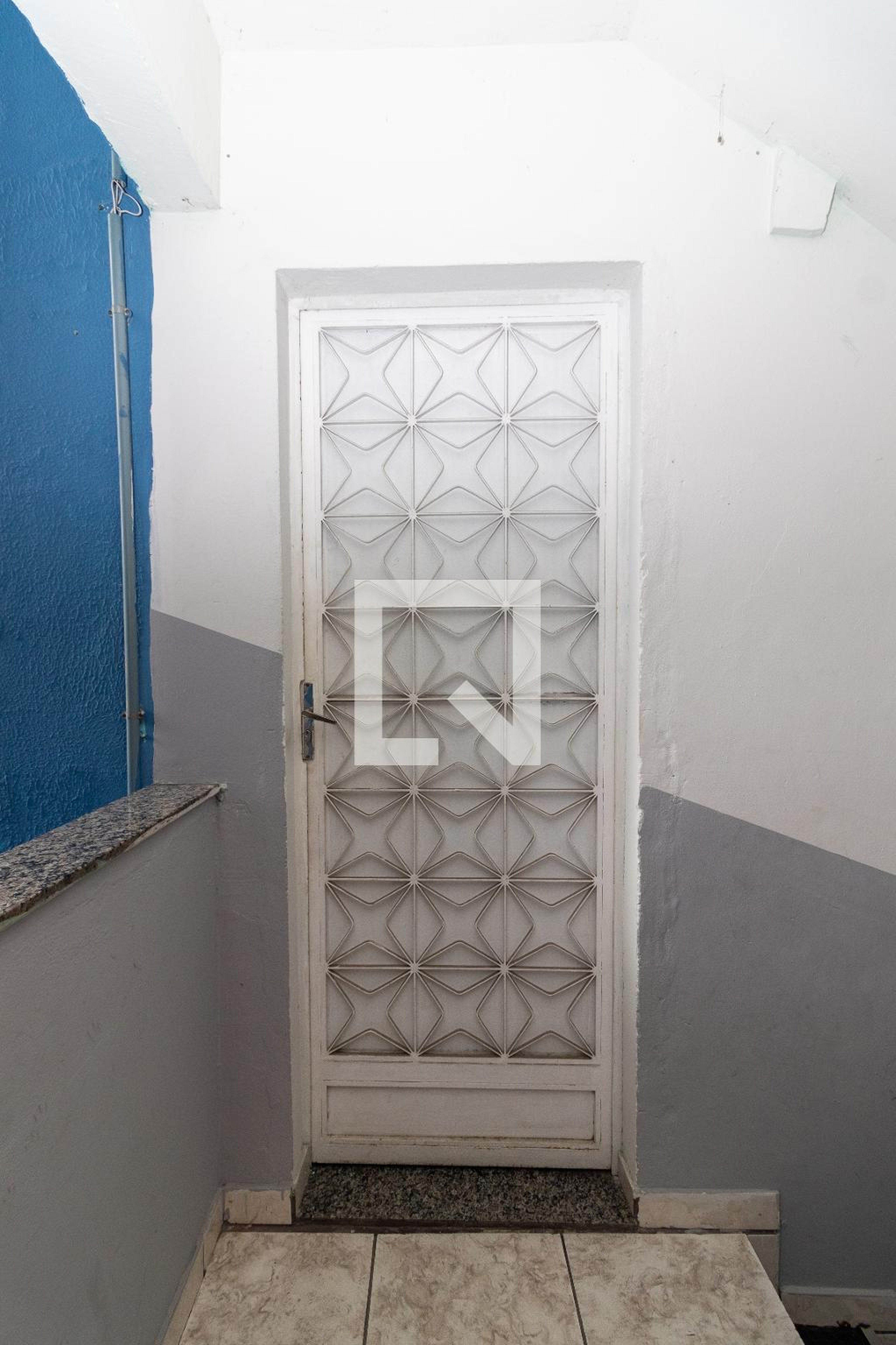 Entrada Condomínio em Rua Itacorovi, 136