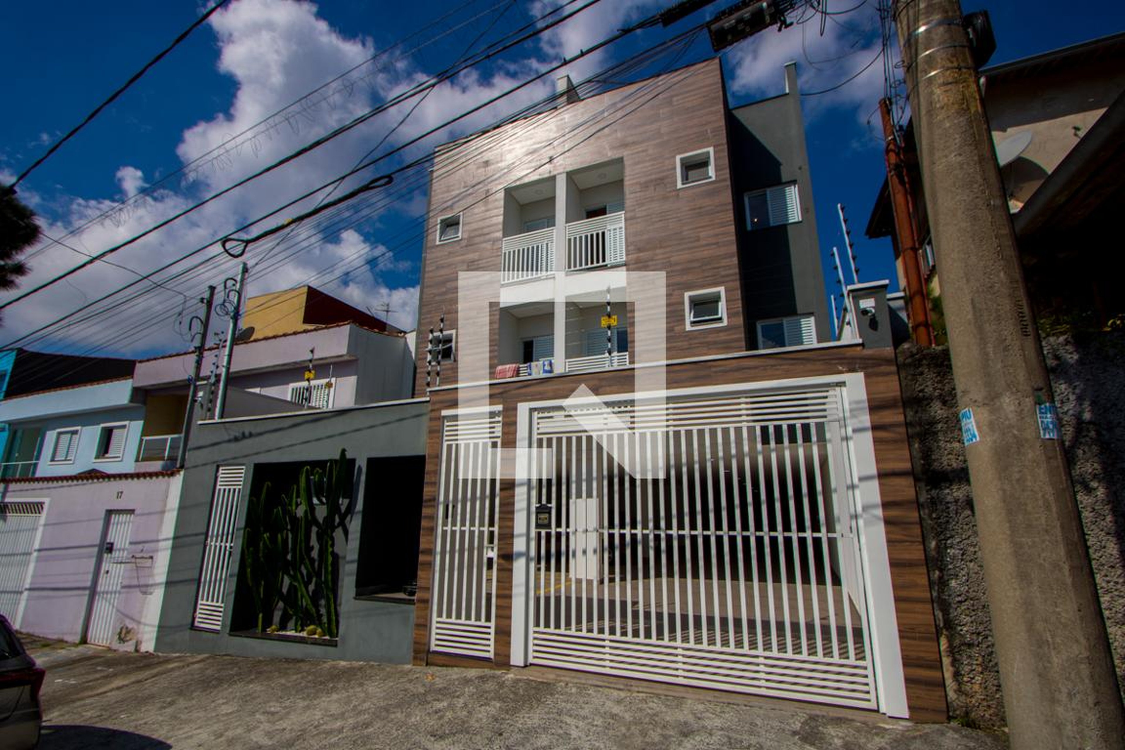 Fachada Condomínio em Rua Albino, 33