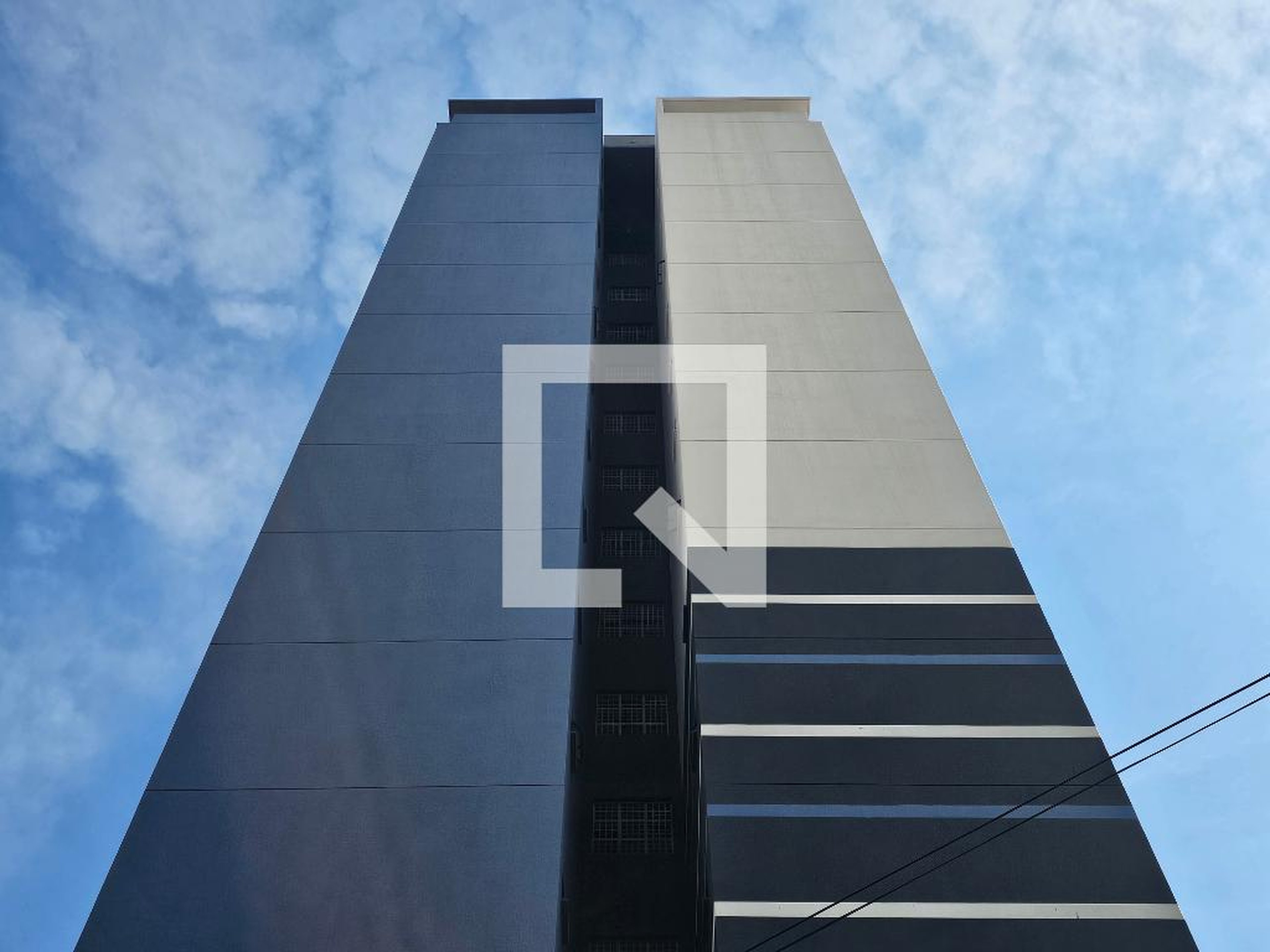 Fachada Condomínio em Rua Lopes de Oliveira, 598