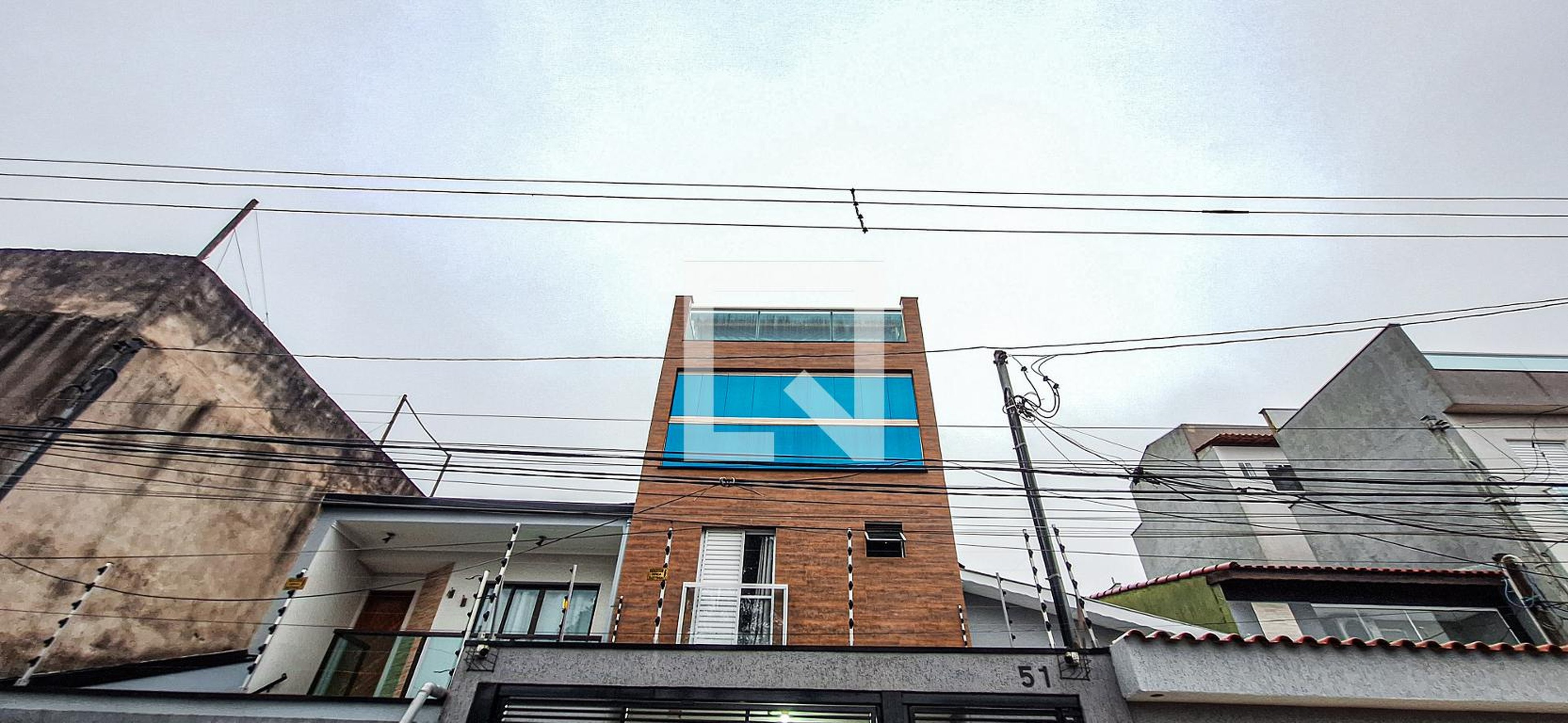 Fachada Condomínio em Rua Tefé, 51
