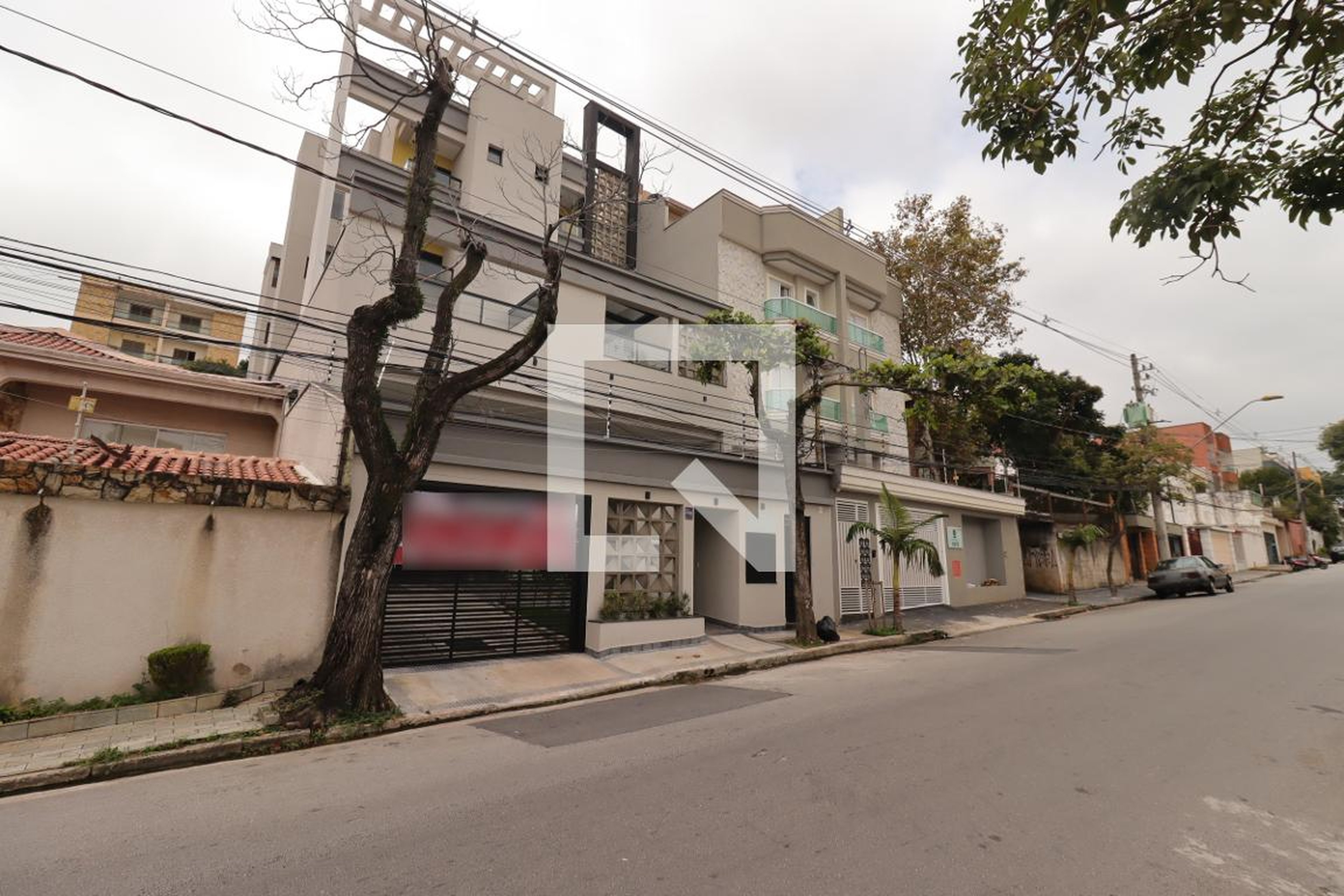 Fachada Condomínio Res Vila das Orquidias