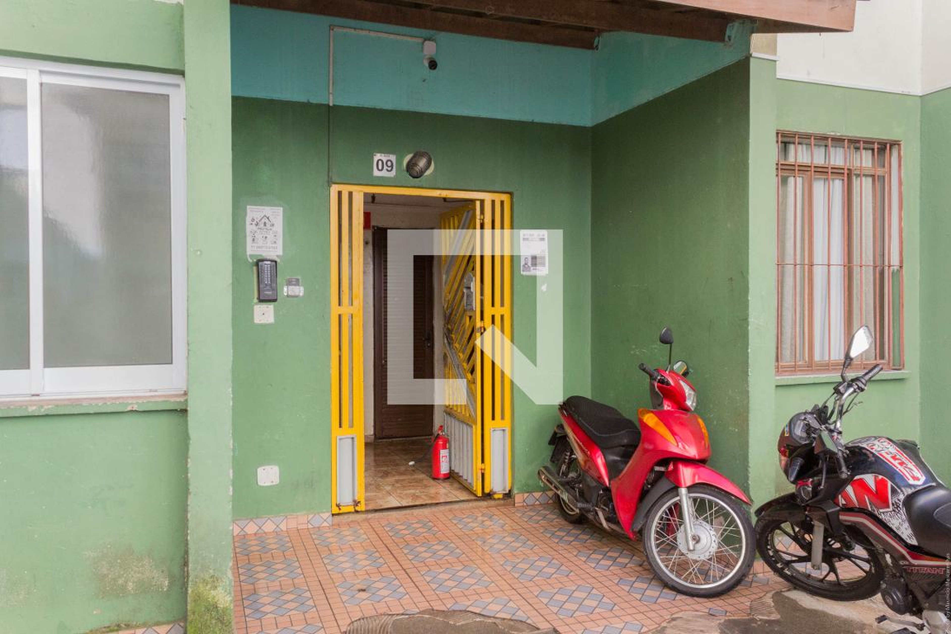 Fachada Condomínio em Rua Beta Dragone, 118