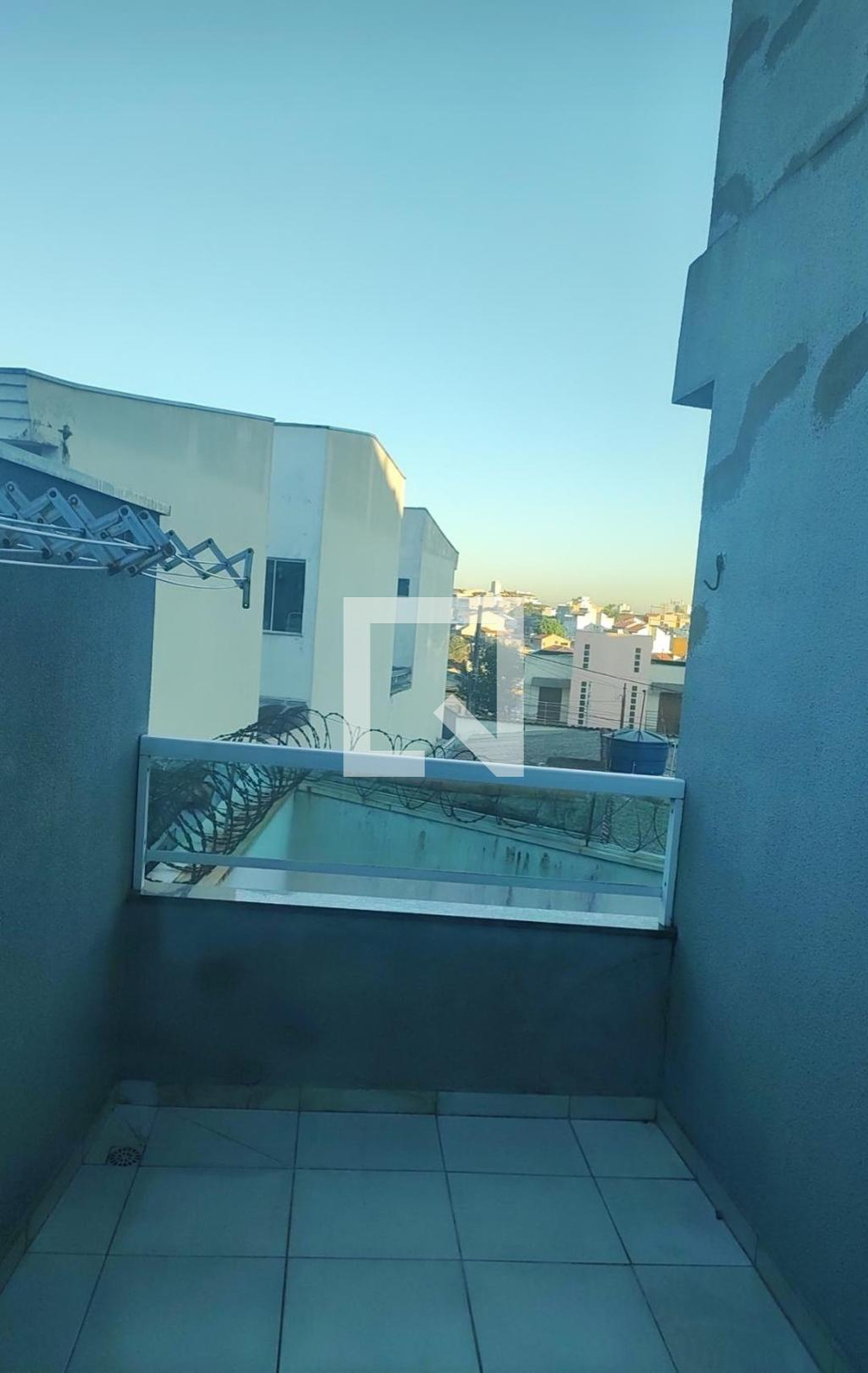 Área externa Condomínio em Rua Juno, 156