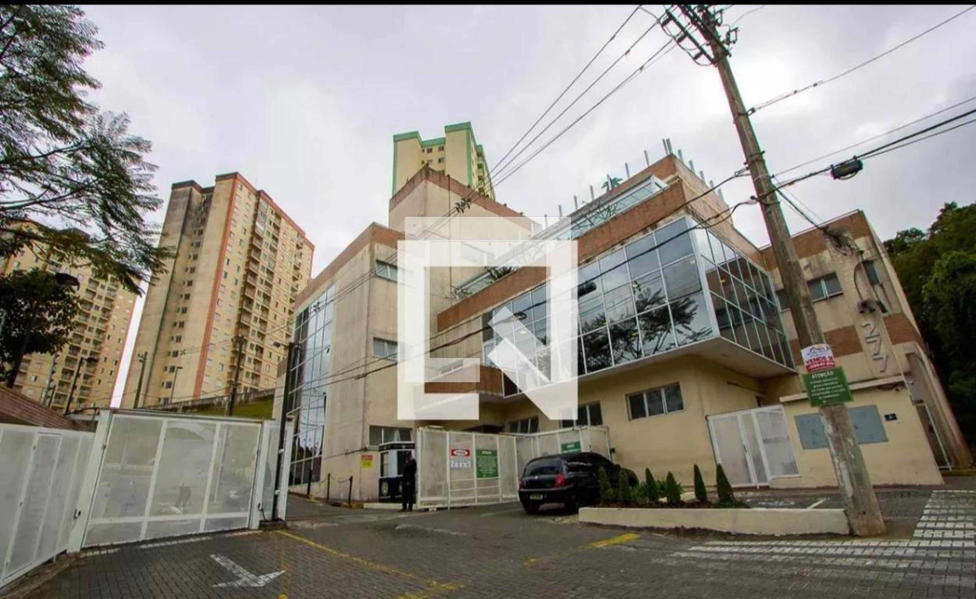 Fachada Condomínio em Rua Orlando Tasca, 92
