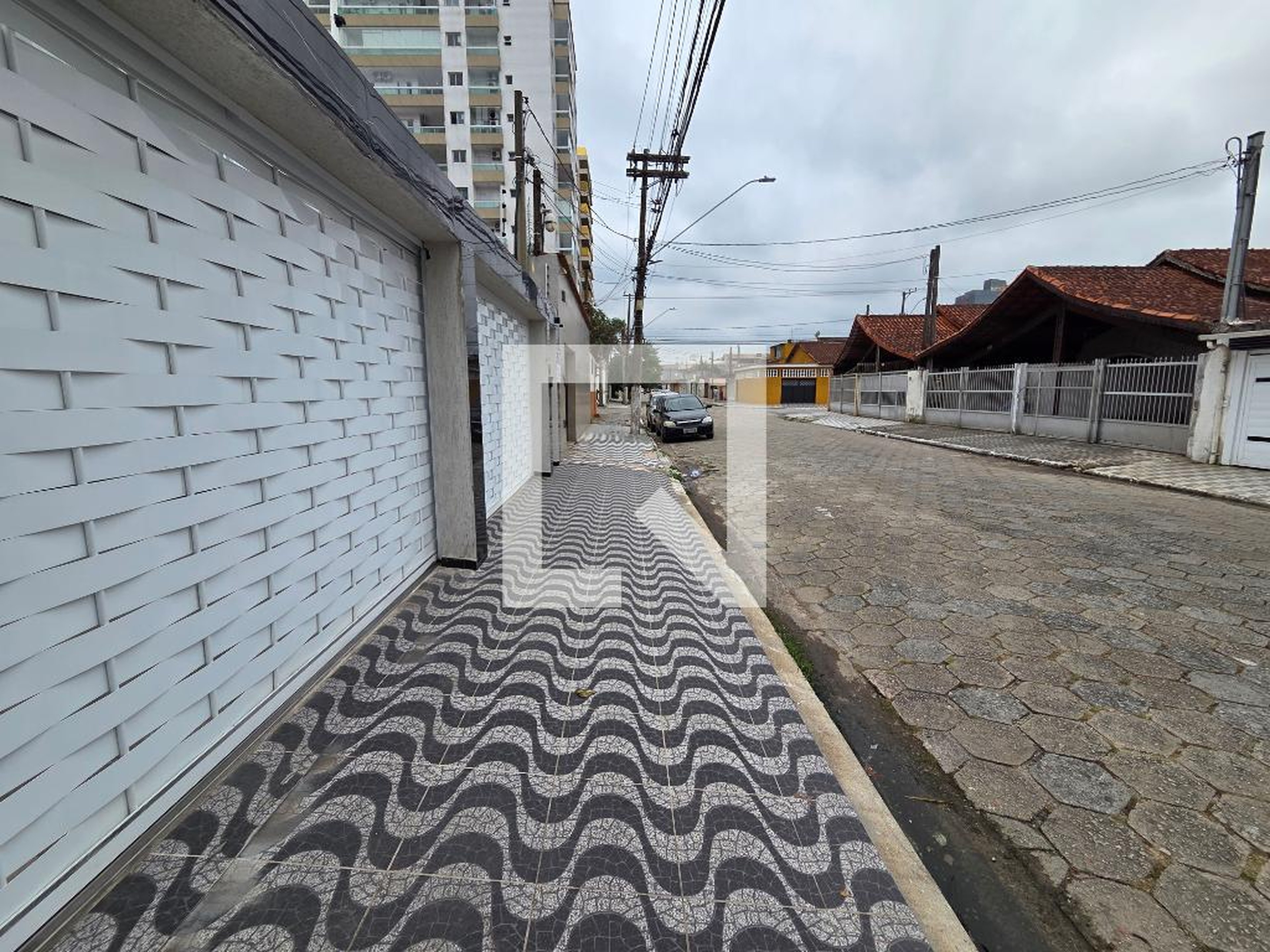 Fachada Condomínio em Rua Doutor Cyro Carneiro, 549