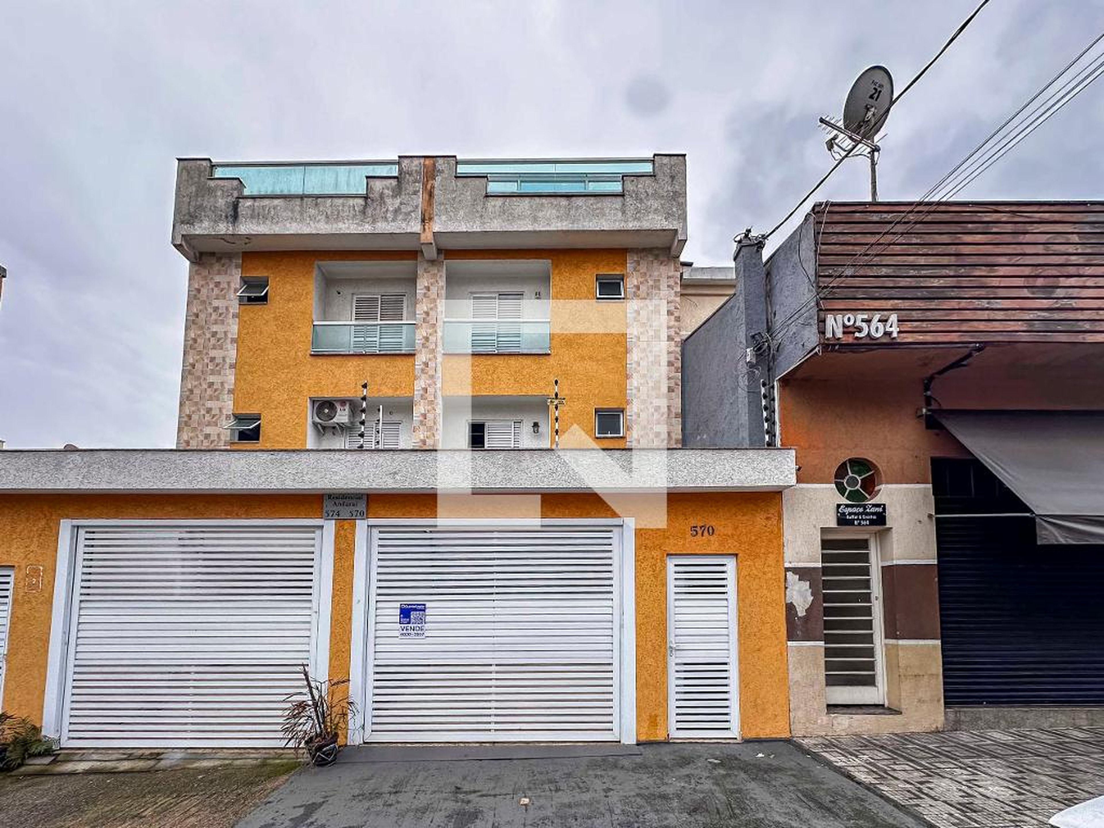Fachada Condomínio em Rua Andarai, 570