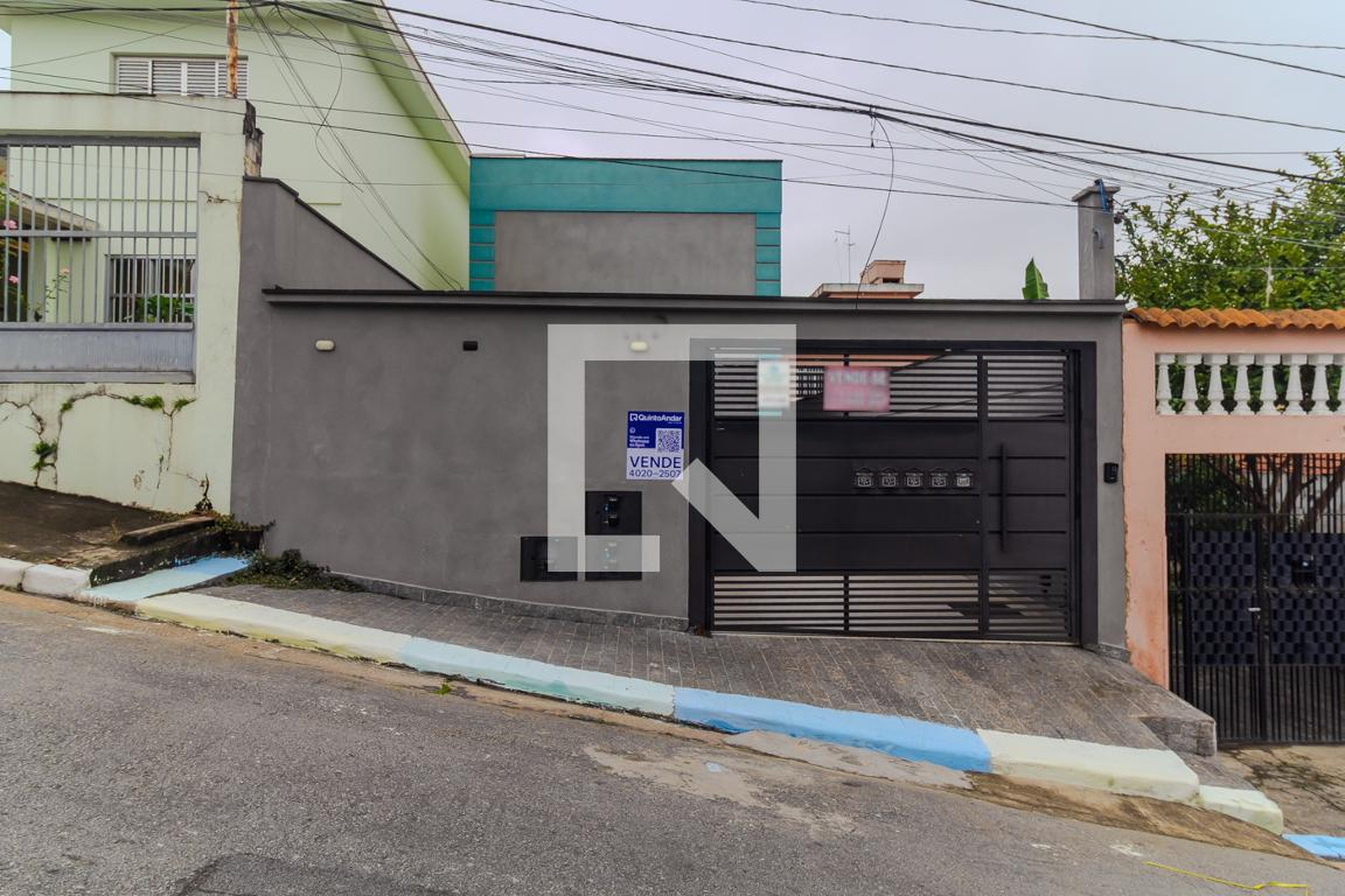Fachada Condomínio em Rua Cesário dos Santos, 199