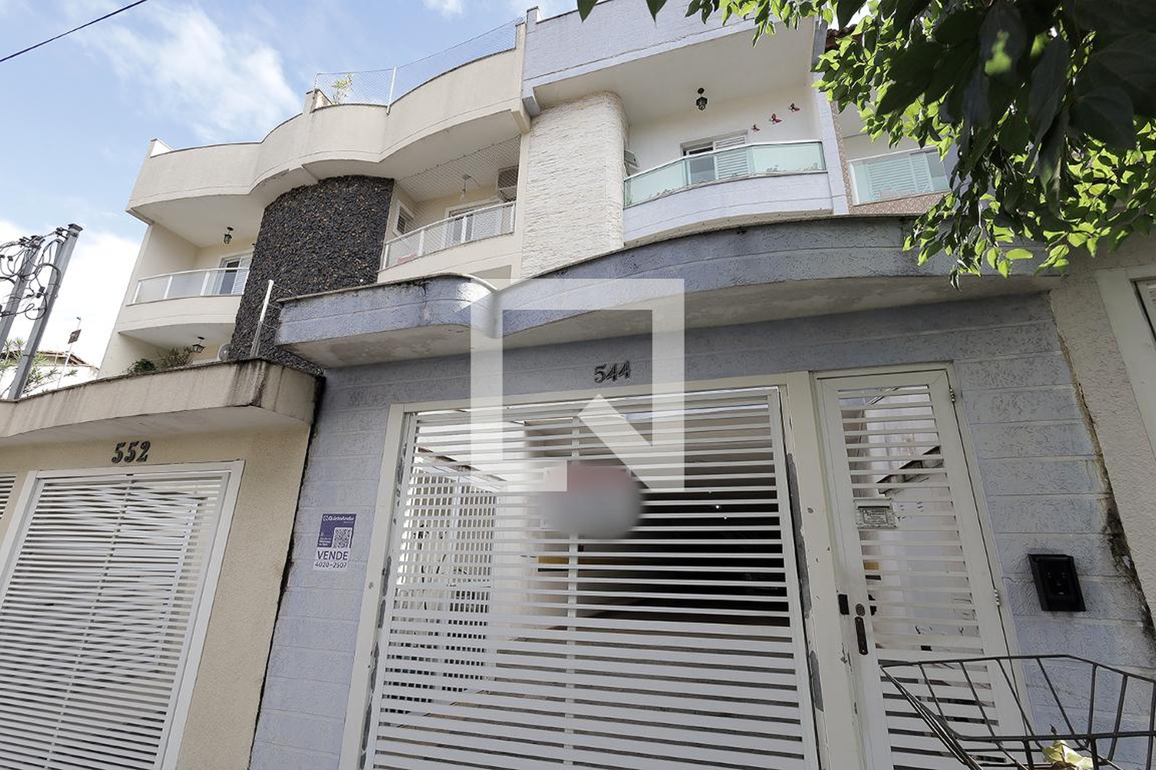 Fachada Condomínio em Rua Coroados, 544