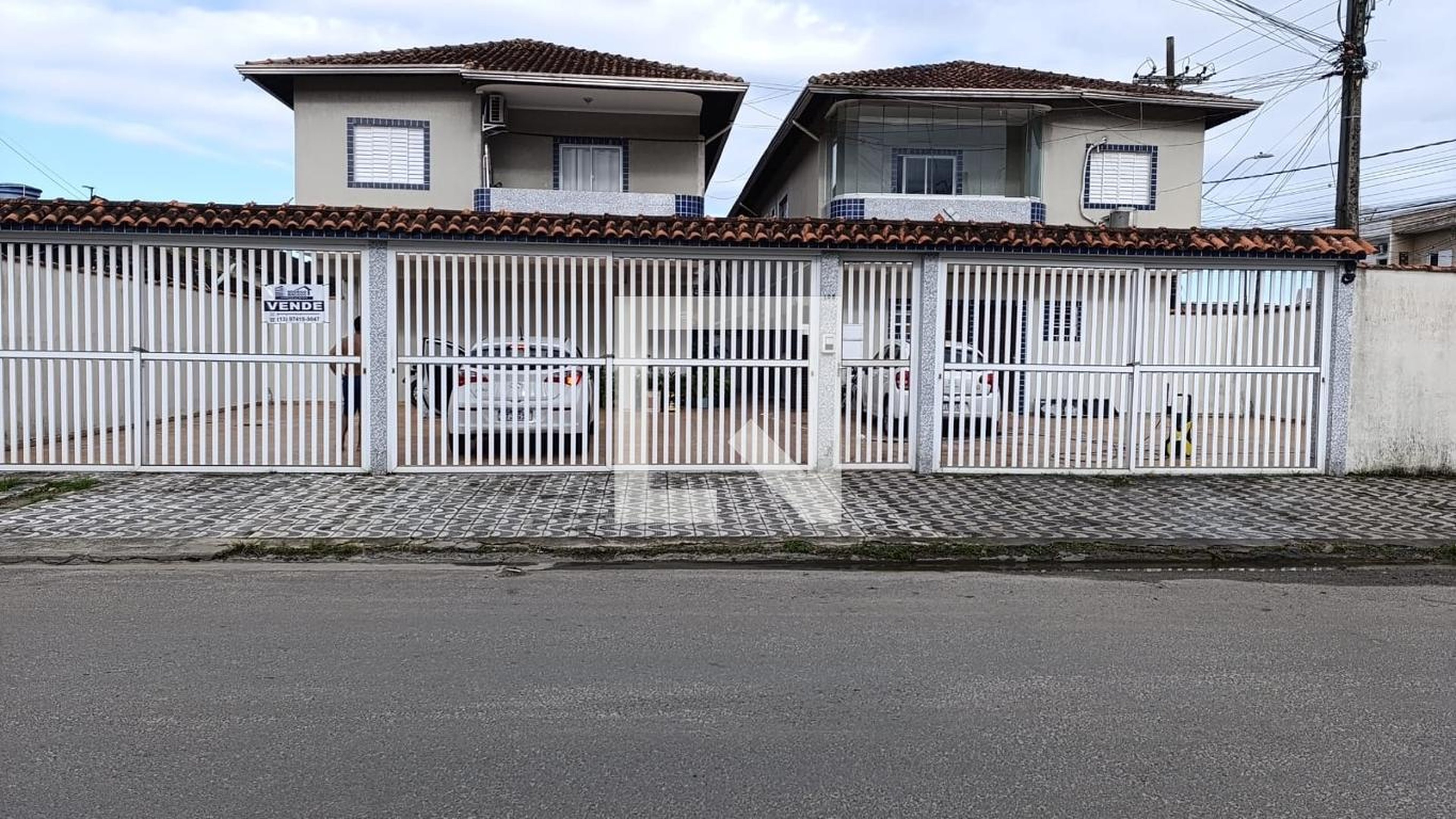 Fachada Condomínio em Rua Heitor Vila Lobos, 105