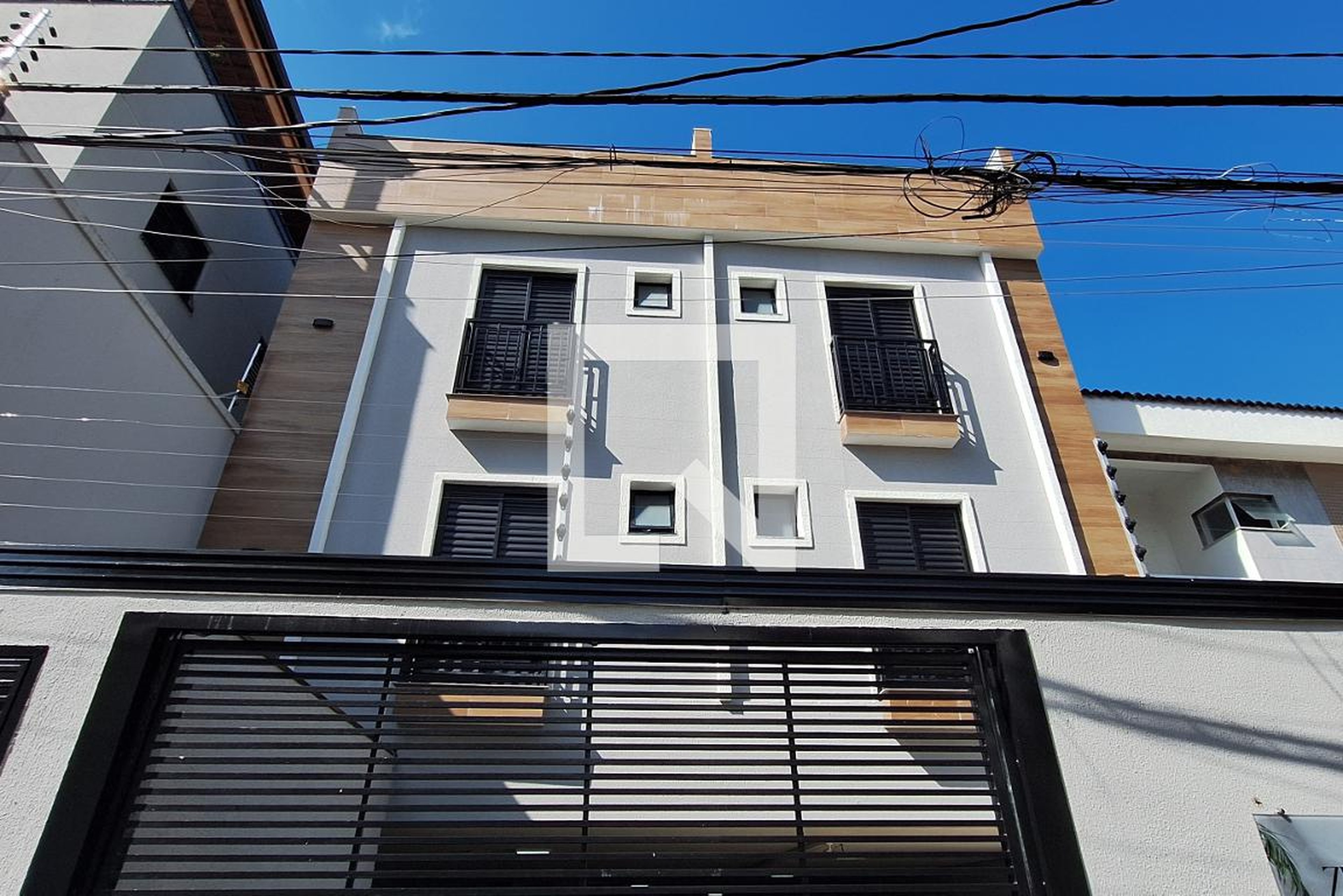Fachada Condomínio em Rua Gonzaga Franco, 1