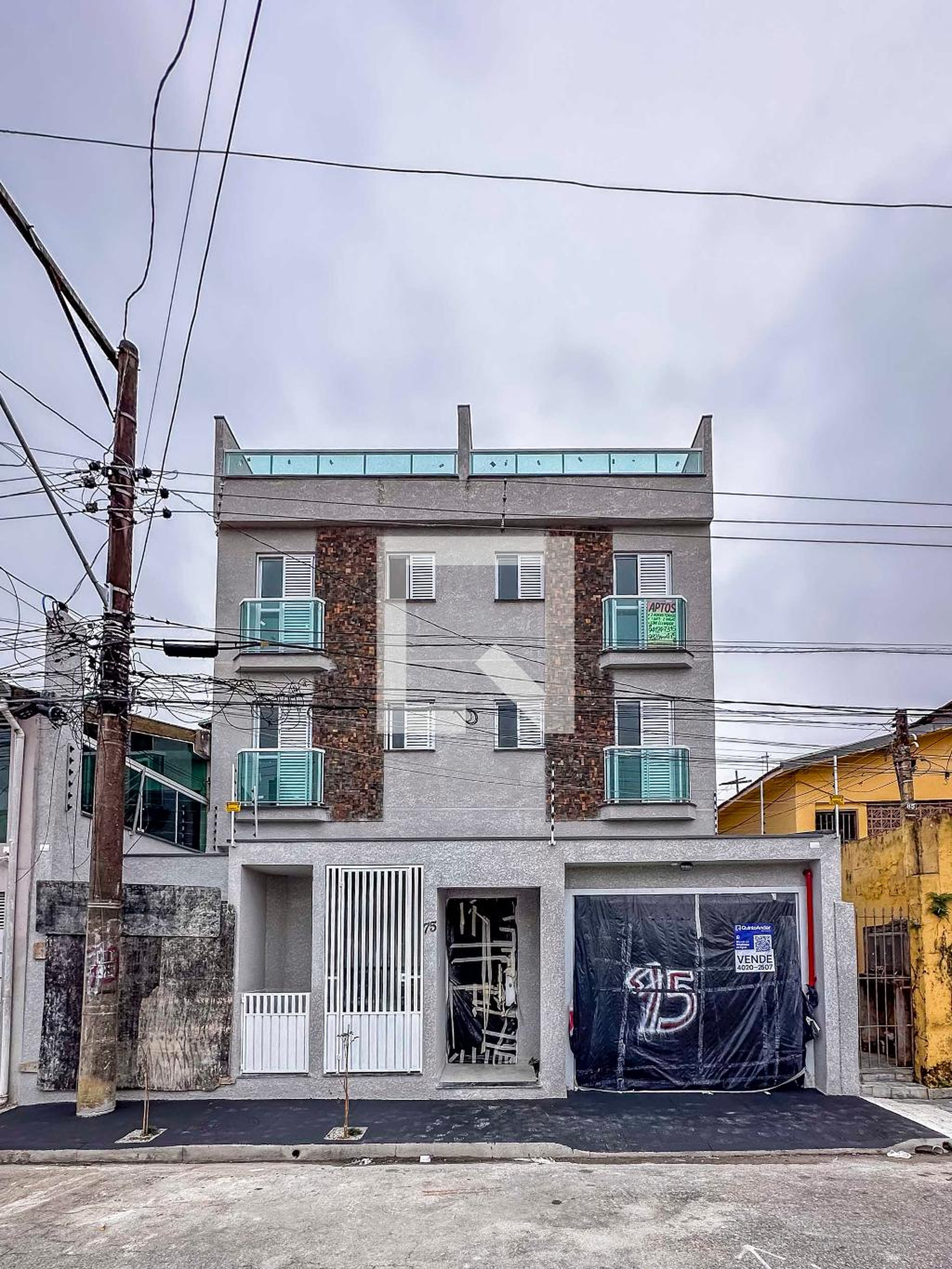 Fachada Condomínio em Rua Horácio Hunti, 75