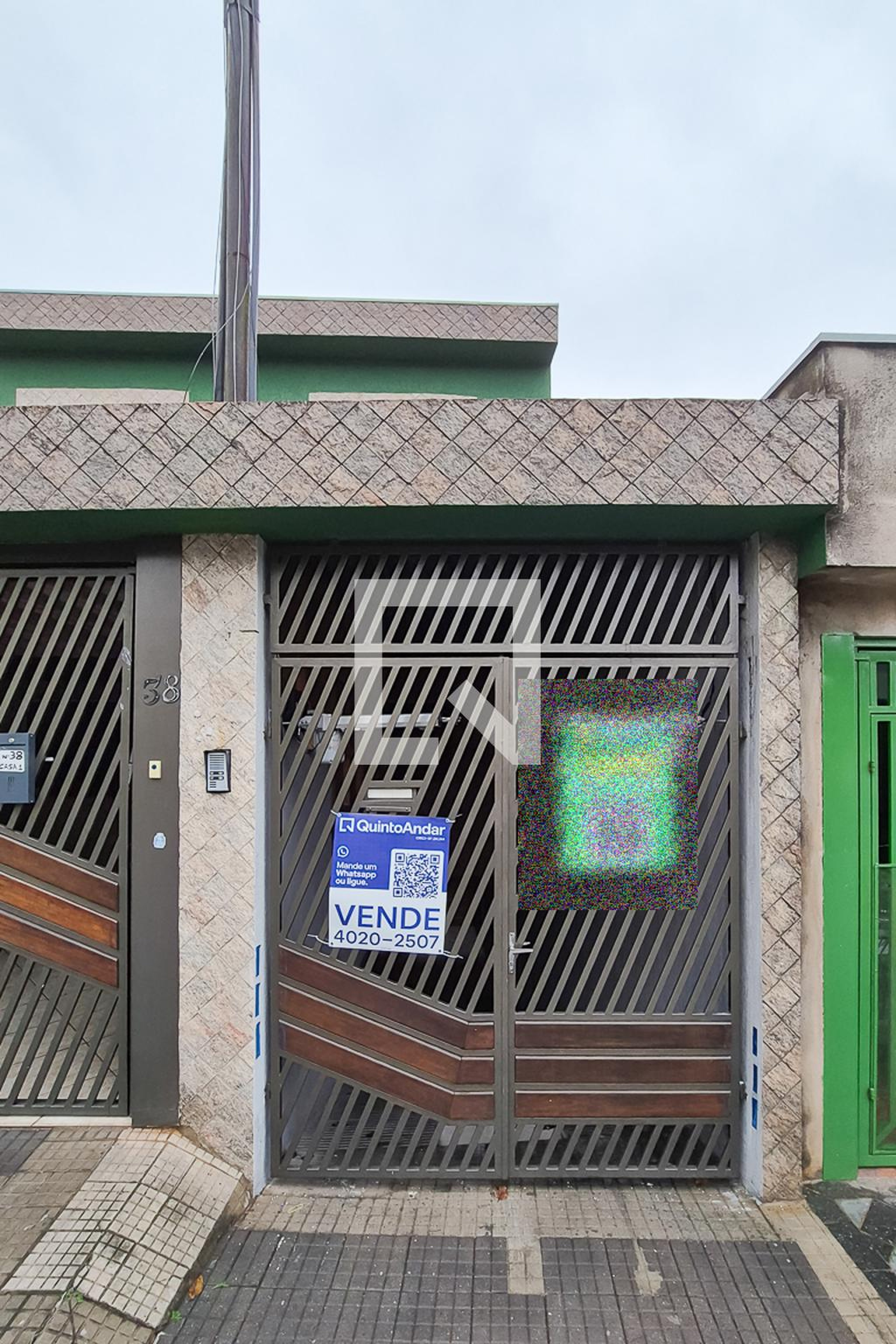 fachada Condomínio em Rua Sargento Flamínio Baptista dos Santos, 38