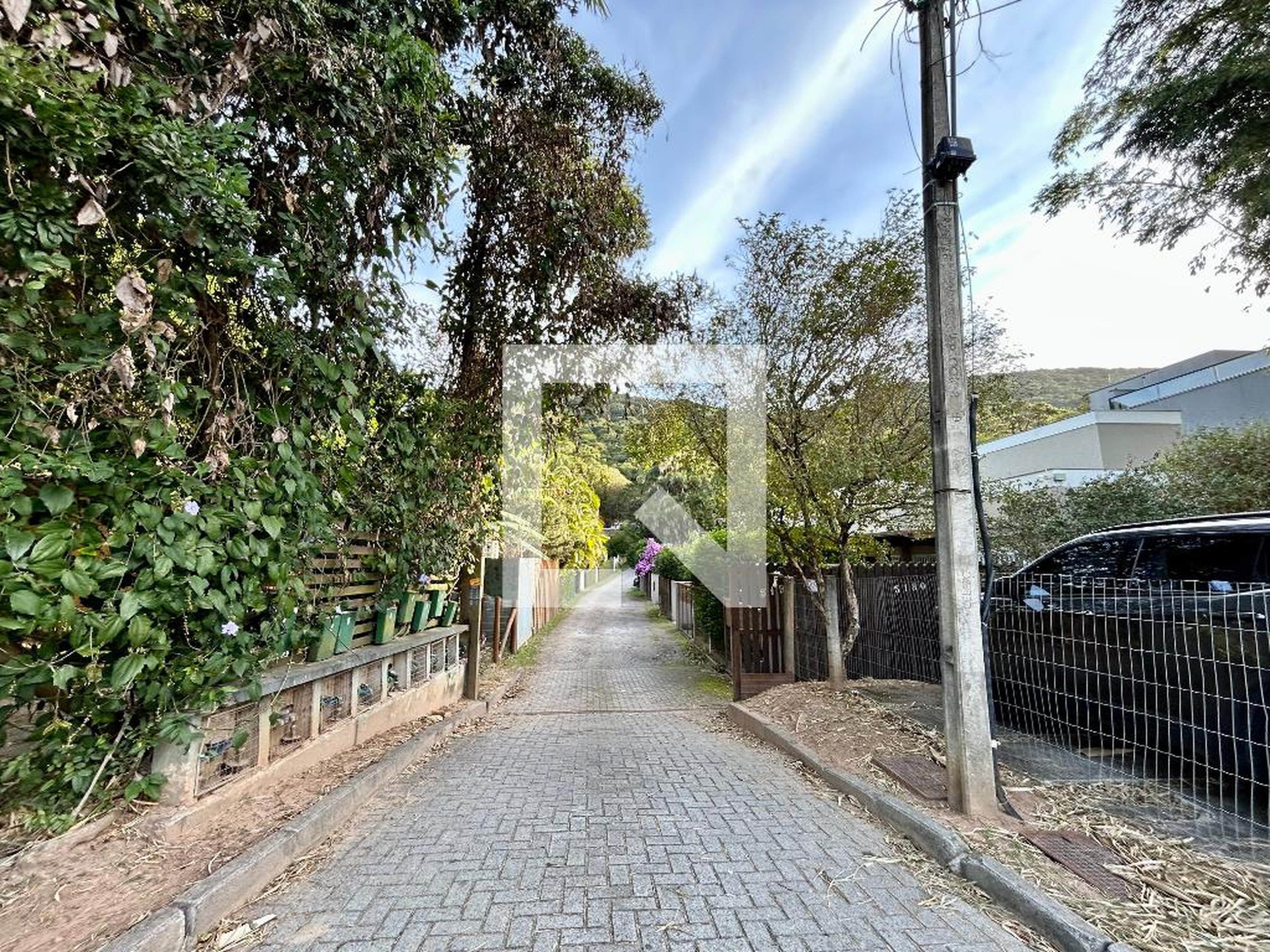 Fachada Condomínio em Rua Laurindo Januário da Silveira, 5198