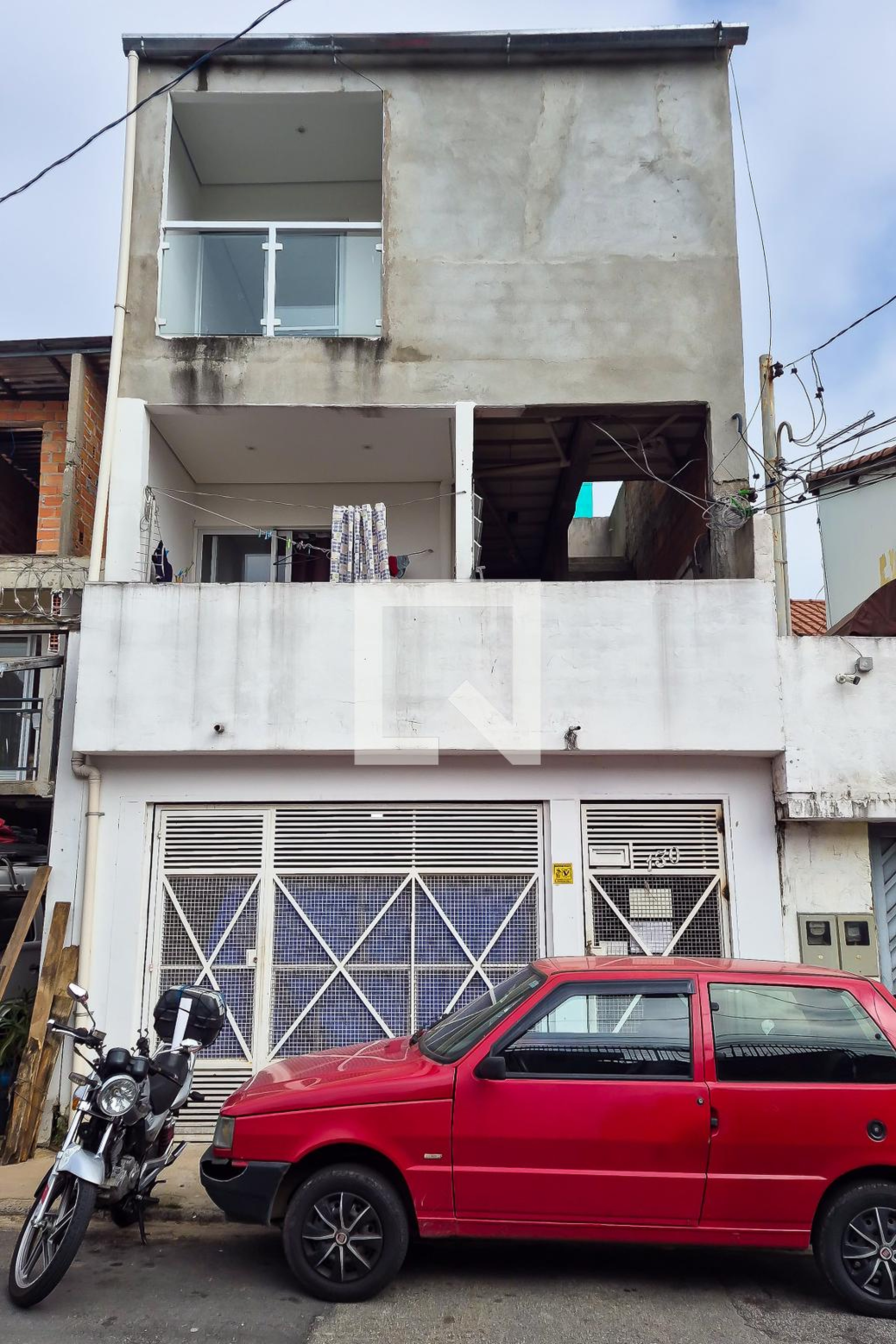 Fachada Condomínio em Rua Heitor Gouvea, 130