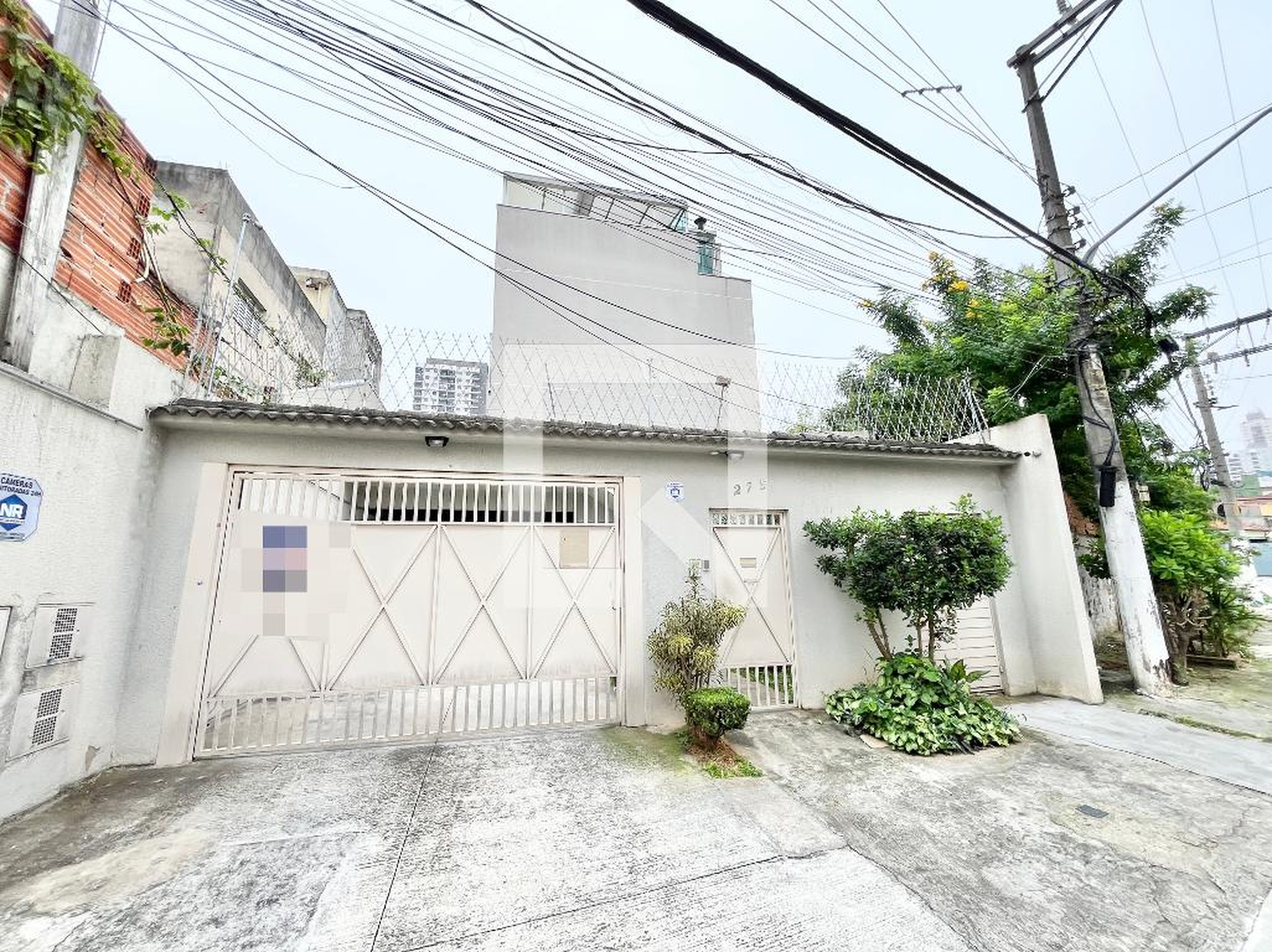 Fachada Condomínio em Rua Júlio Rodrigues Mendes, 279
