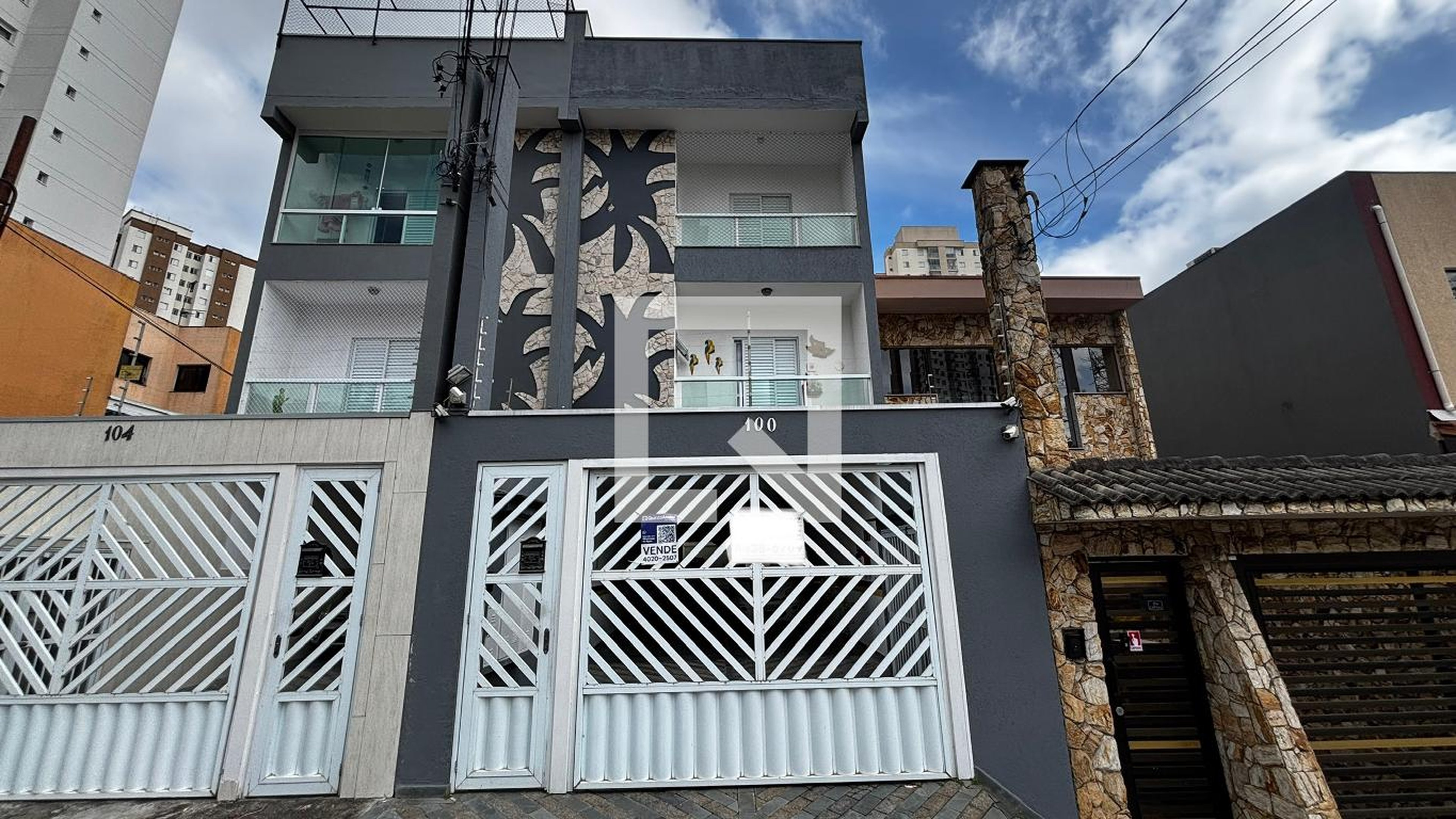 Fachada Condomínio em Rua Cotoxó, 100