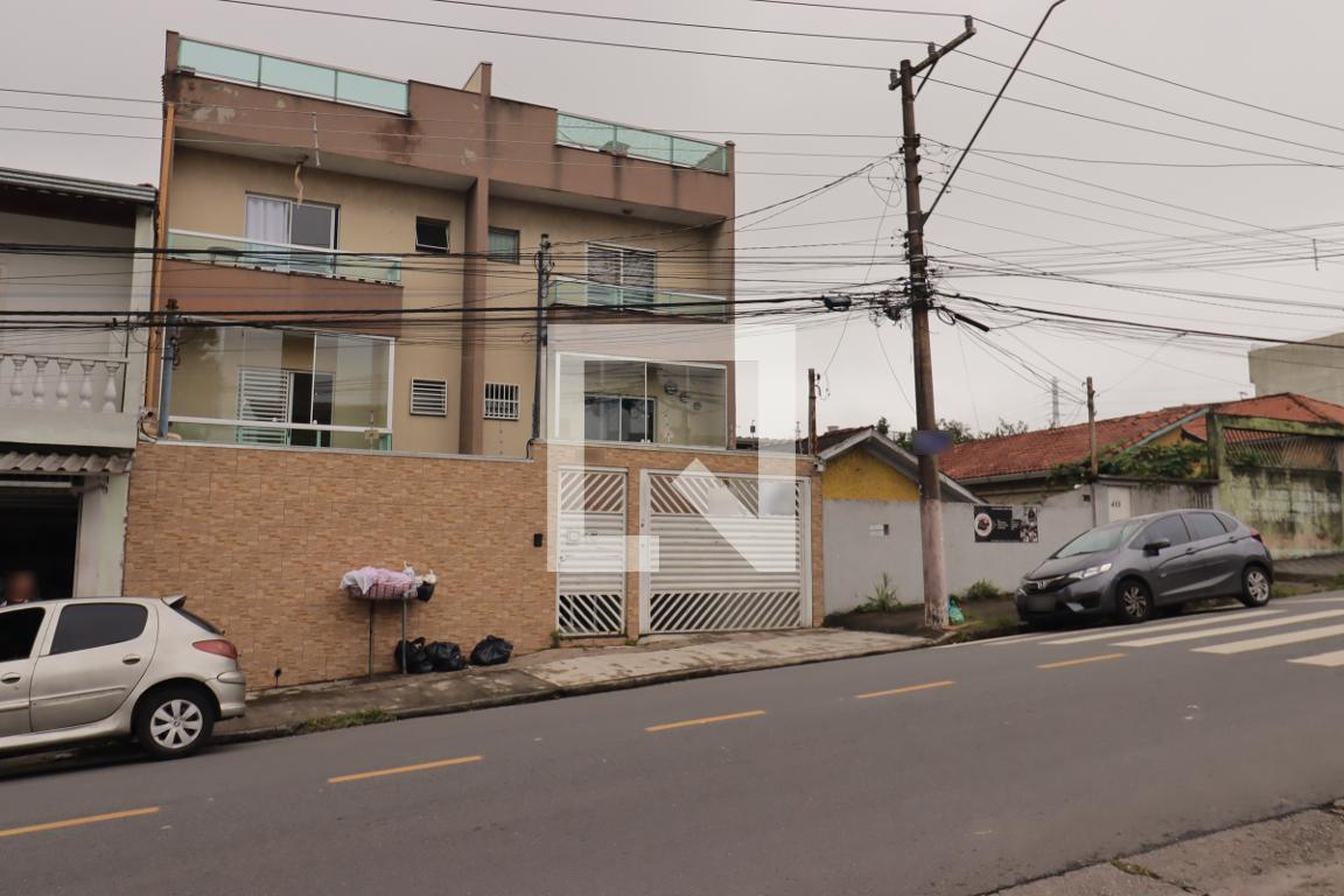 Fachada Condomínio em Rua Brasílio Rodrigues, 405