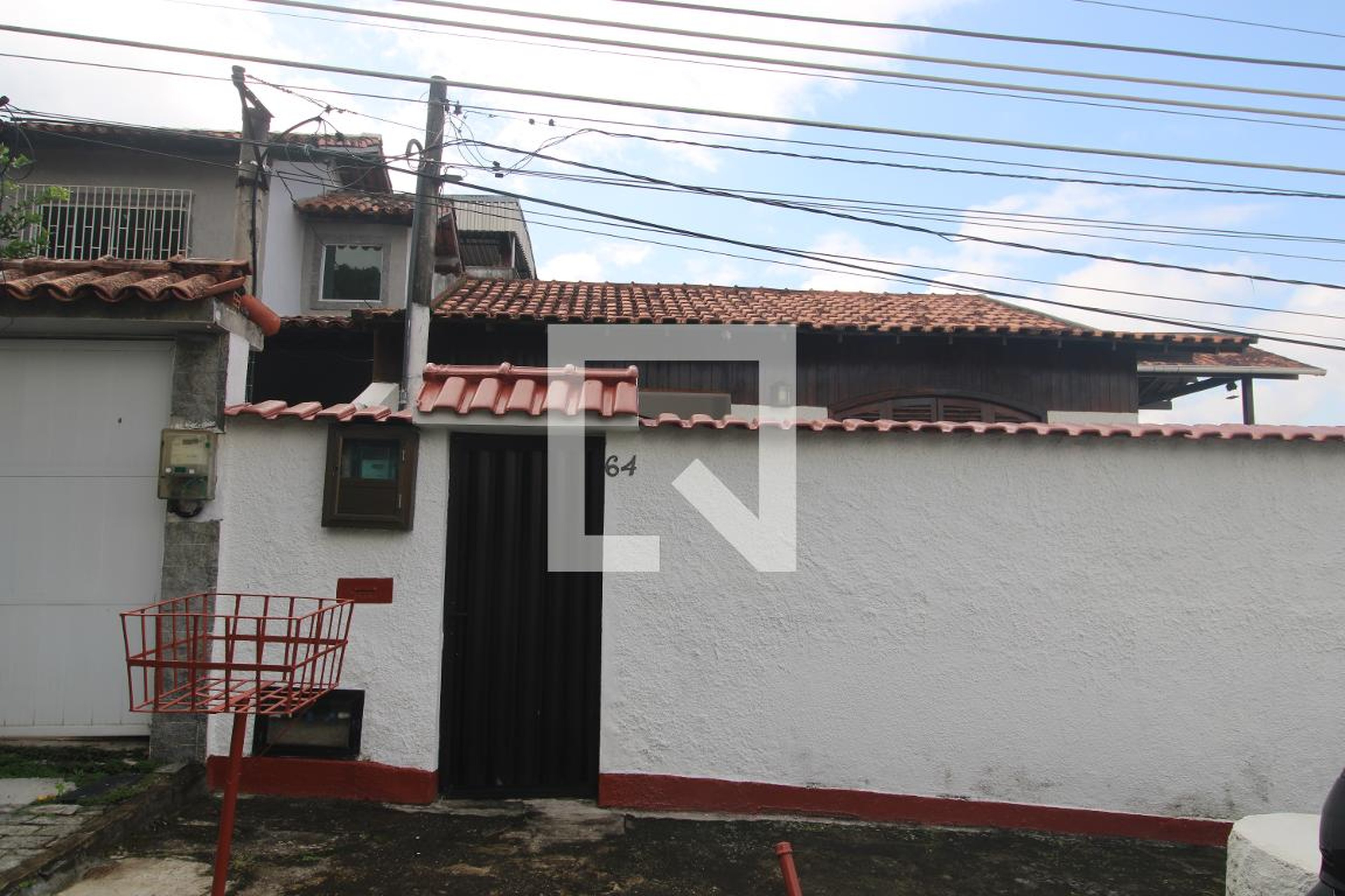 Fachada Condomínio em Rua Lídio de Souza, 64