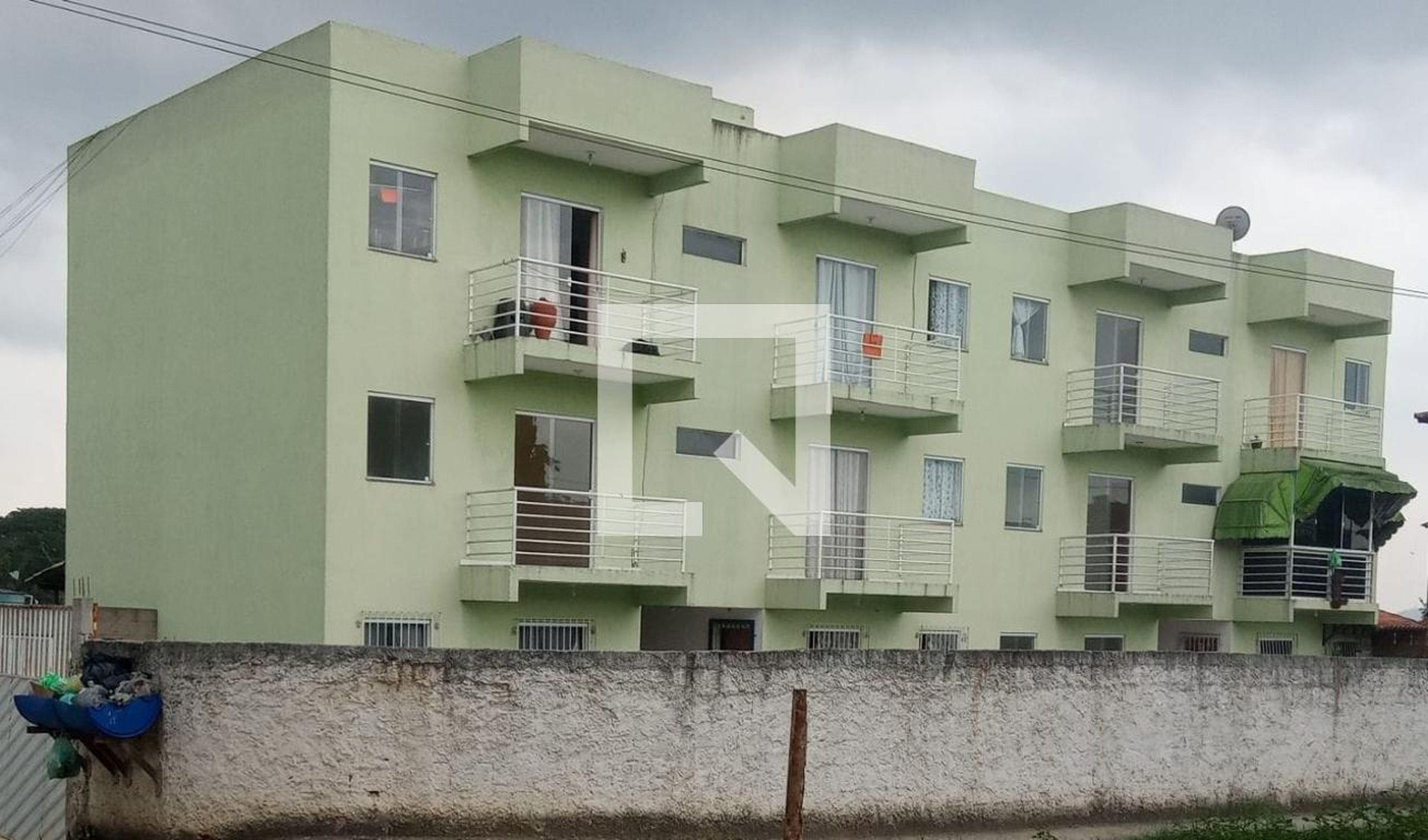 Fachada Condomínio em Rua Souza Costa, 555