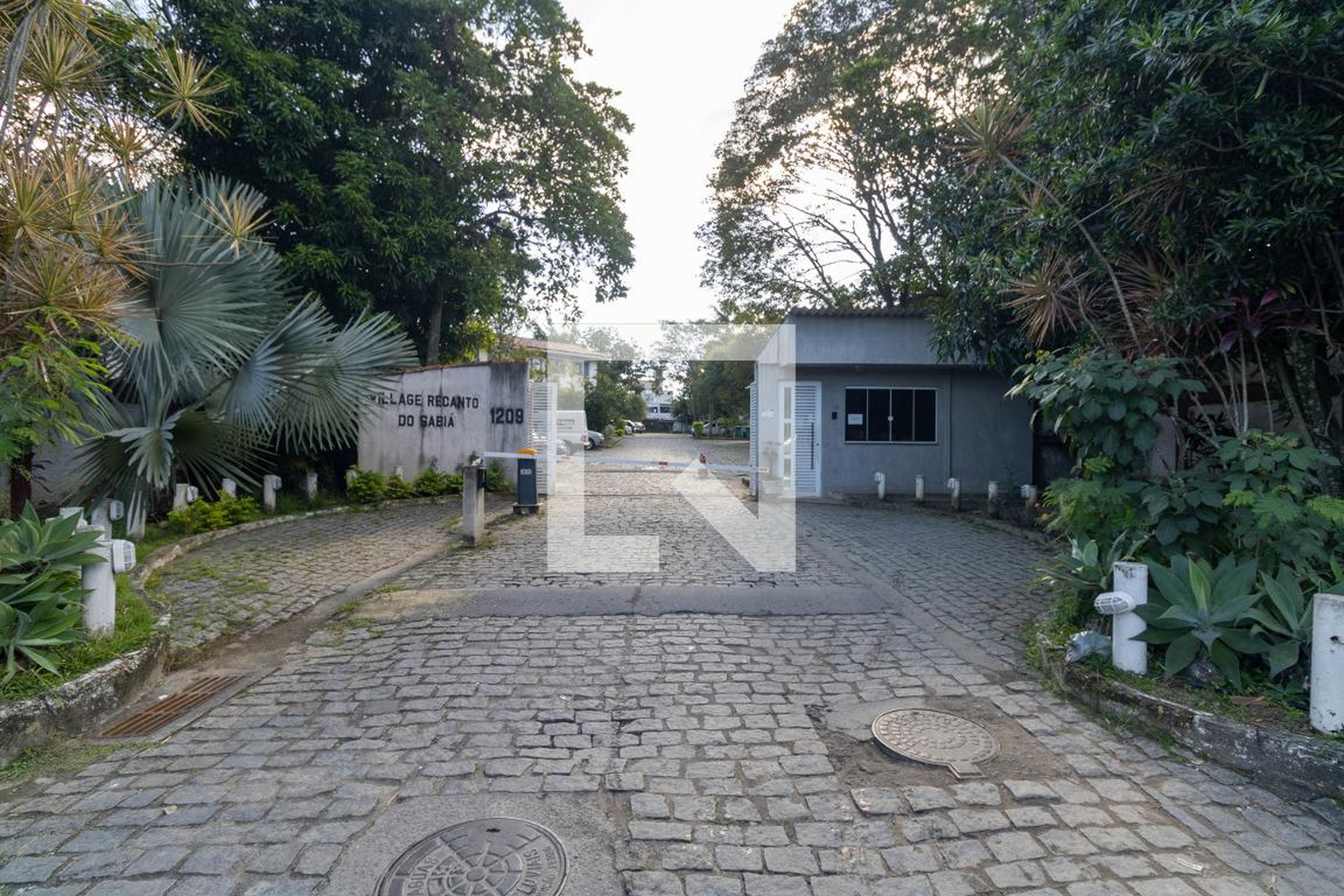 Fachada do condomínio Condomínio Village Recanto do Sabiá
