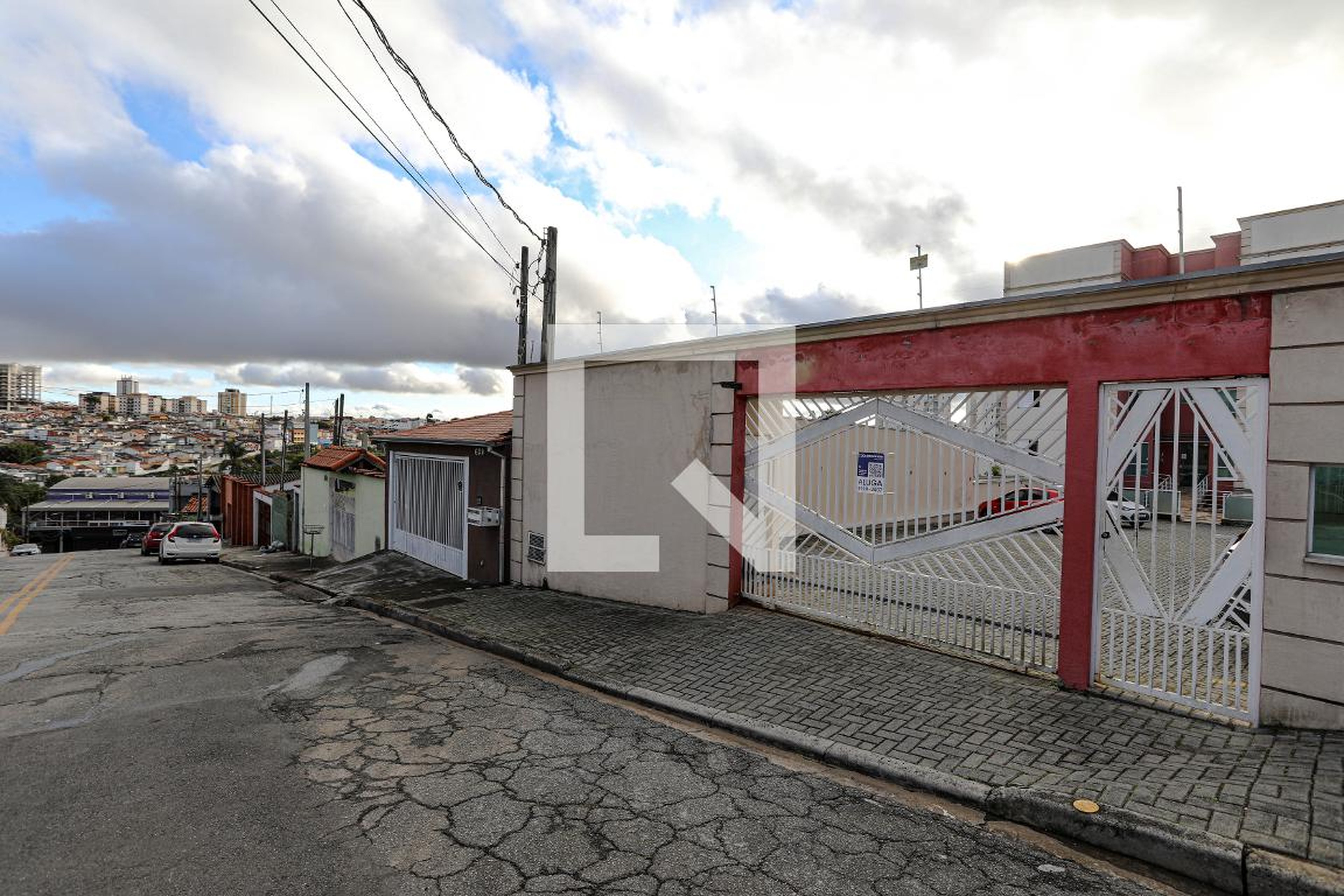 Fachada Condomínio em Rua Gastão Costa, 612